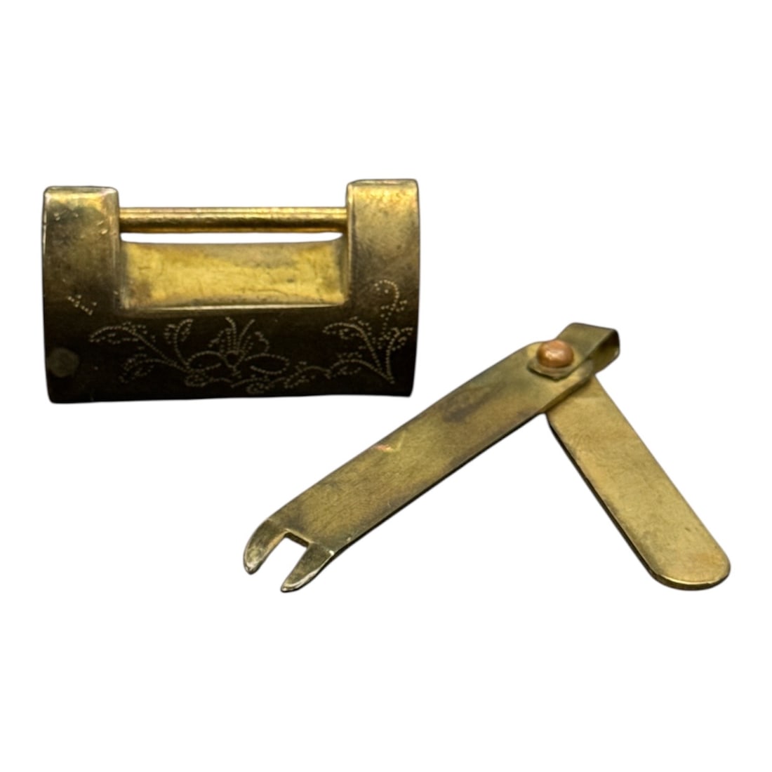 Vintage Chinese Brass Pad Lock: Item Type: Chinese horizontal-style padlock and key set.Material: Forged or cast brass with a natural aged patina.Design: The front of the lock body features intricate hand-etched
