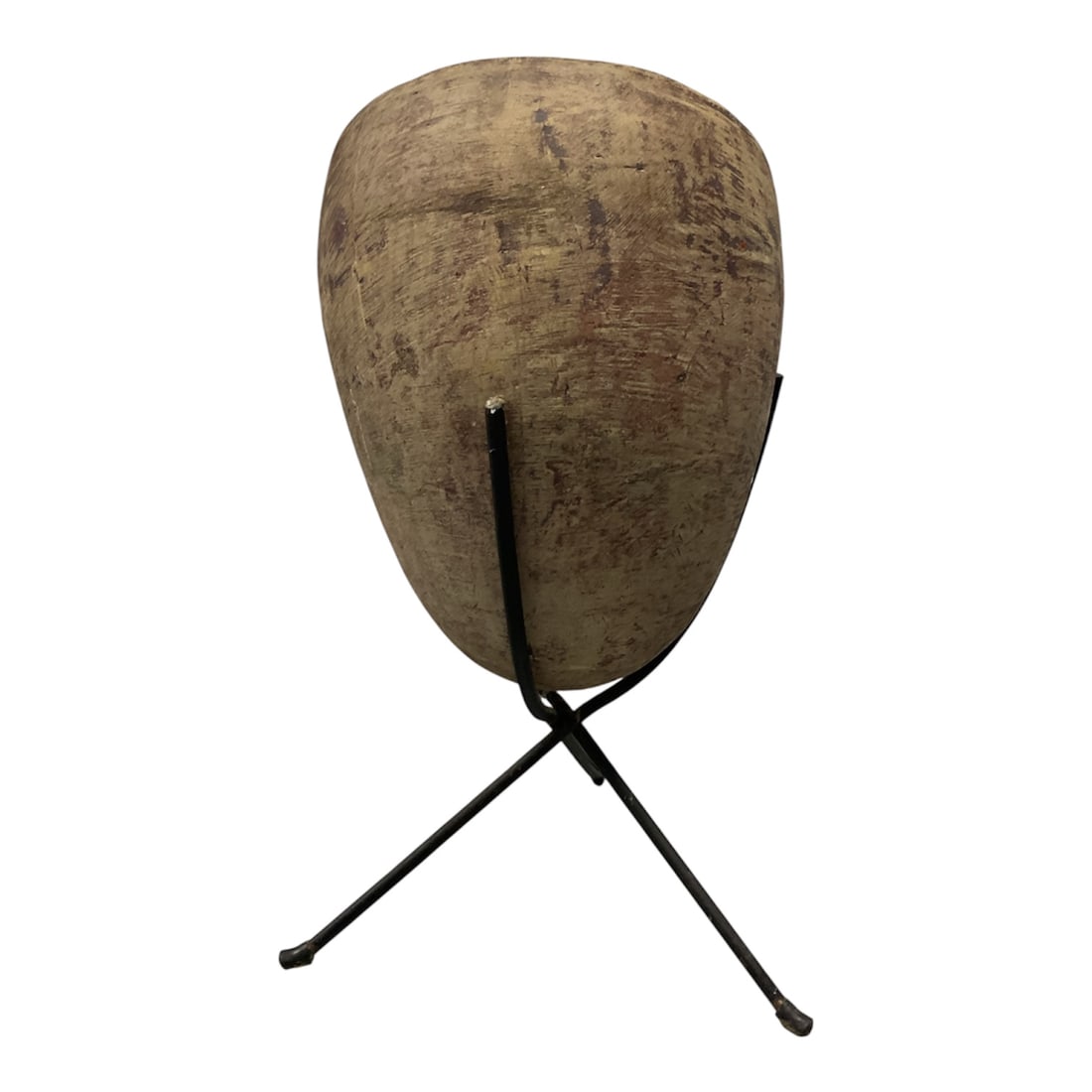 Vintage Tribal "Bailer" Shell Pectoral Ornament/Planter on Custom Iron Stand: Vintage Tribal "Bailer" Shell Pectoral Ornament on Custom Iron StandDescription:A striking tribal artifact featuring an organic, ovoid form with a naturally weathered, textured surface and