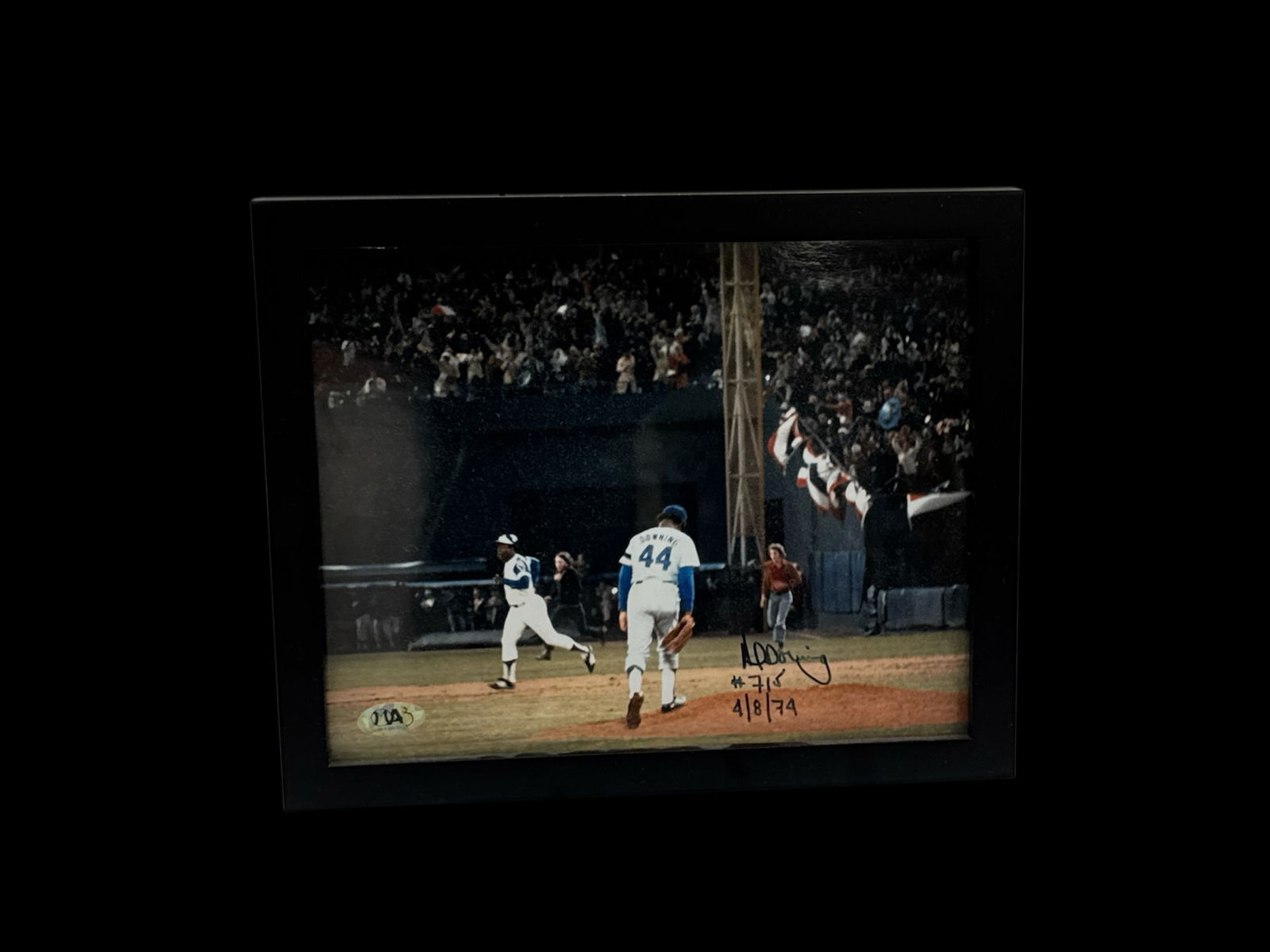 Al Downing Signed Photograph Inscribed #715 April 8 1974: This framed photograph features Al Downing, the New York Yankees pitcher who famously surrendered Hank Aaron’s historic 715th career home run on April 8, 1974. The image captures the iconic mome