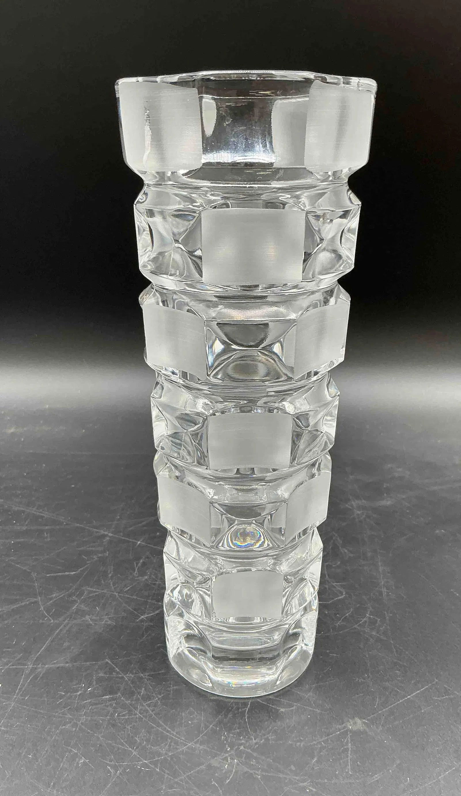 Modern Geometric Crystal Vase with Frosted Accents: Tall clear crystal vase featuring a stacked cube design with alternating frosted panels. A bold, contemporary piece ideal for floral arrangements or as a standalone decorative item.Medium: Cut and fro