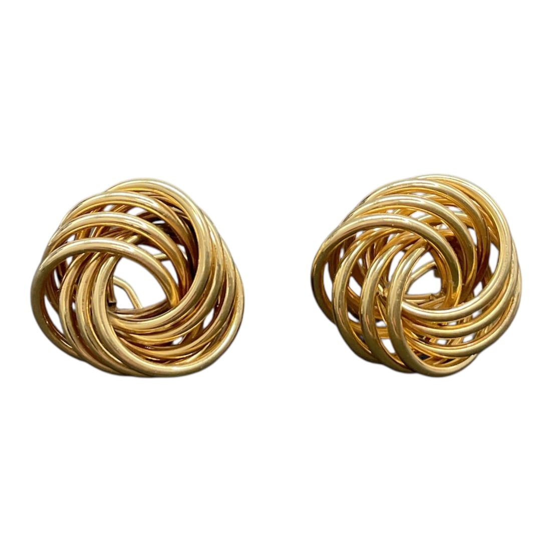 14K Gold Knot Cluster Earrings: Pair of 14K gold knot cluster earrings featuring an interwoven circular design of polished gold bands forming a dimensional swirl motif. The sculptural openwork construction creates depth and texture