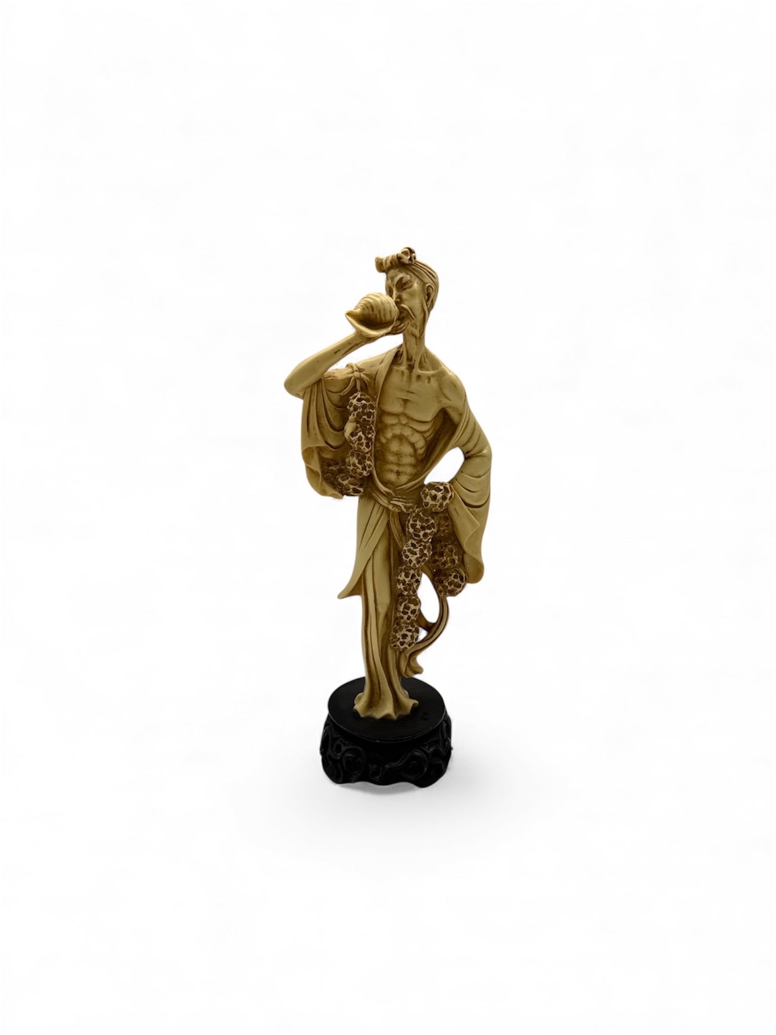 Asian Figurine on Stand: Description: Asian style figurine of a woman holding a bowl, mounted on a black decorative stand.Dimensions: H:18in W:7in