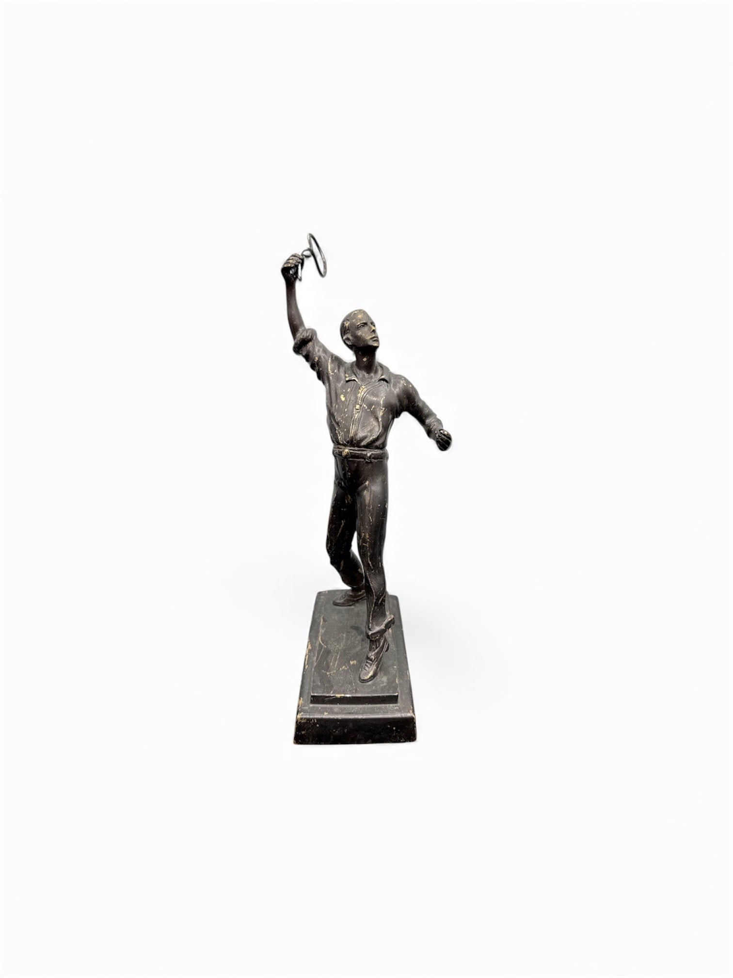Bronze Figure of a Man with Lasso: Description: Bronze figure depicting a man holding a lasso overhead. Mounted on a rectangular base.Dimensions: H:12in W:6in