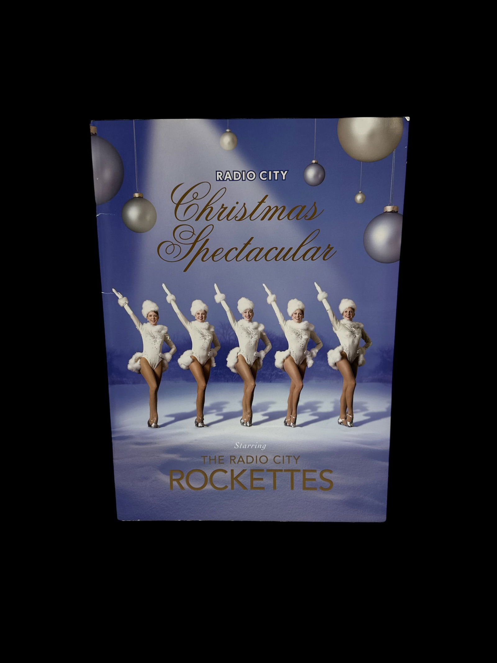 Radio City Christmas Spectacular Book: Radio City Christmas Spectacular book featuring the Rockettes. Dimensions approximately 15 x 11 inches.