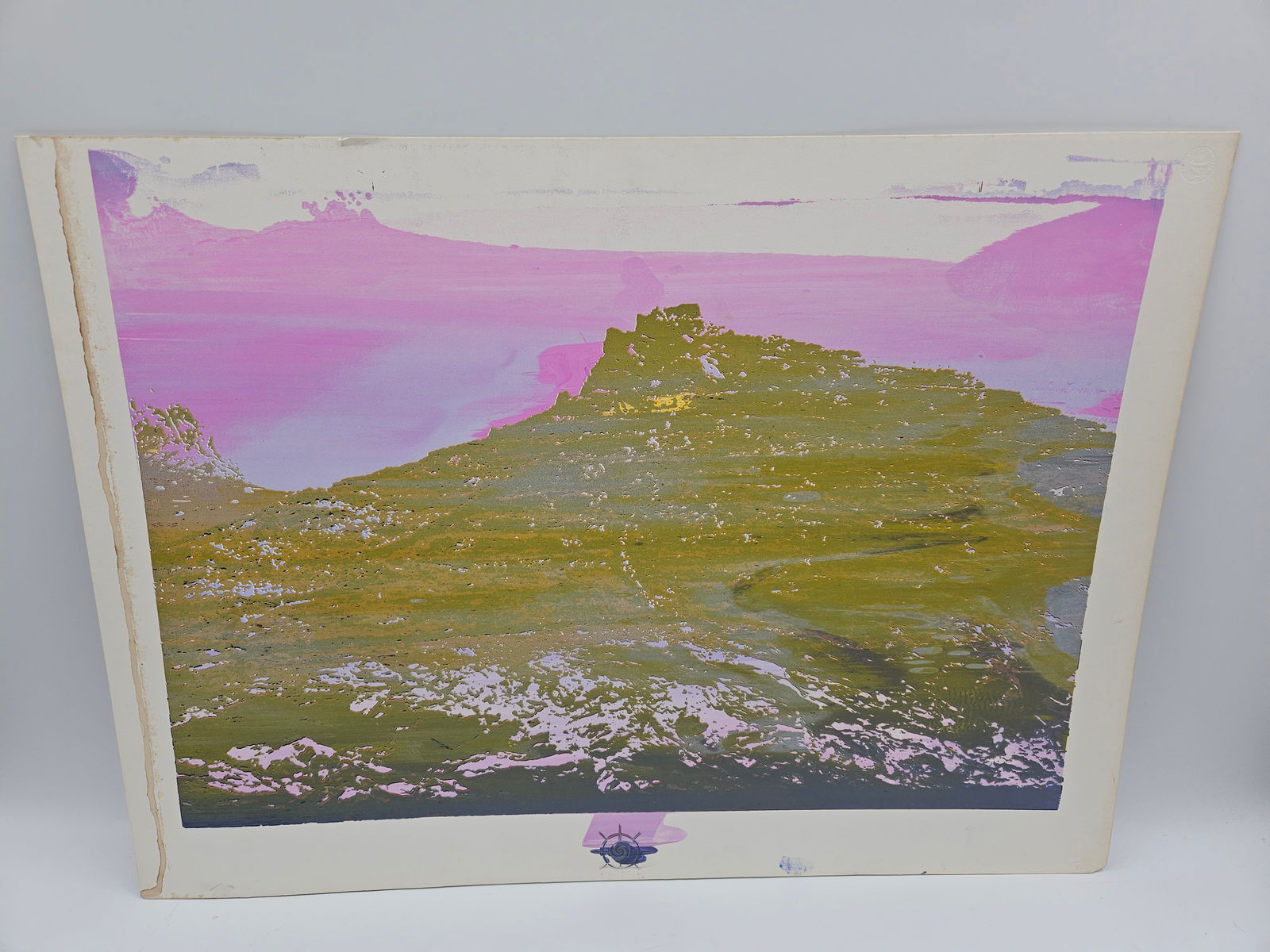 Abstract Landscape Print: Abstract landscape print featuring a mountain range with pink and green hues. Dimensions approximately 22" x 20".