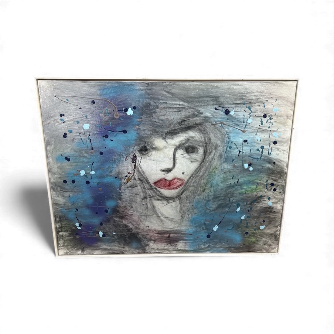 Abstract Portrait Painting: Abstract portrait painting featuring a woman's face with red lips and blue accents. Signed on verso. Dimensions: H:38in L:49in