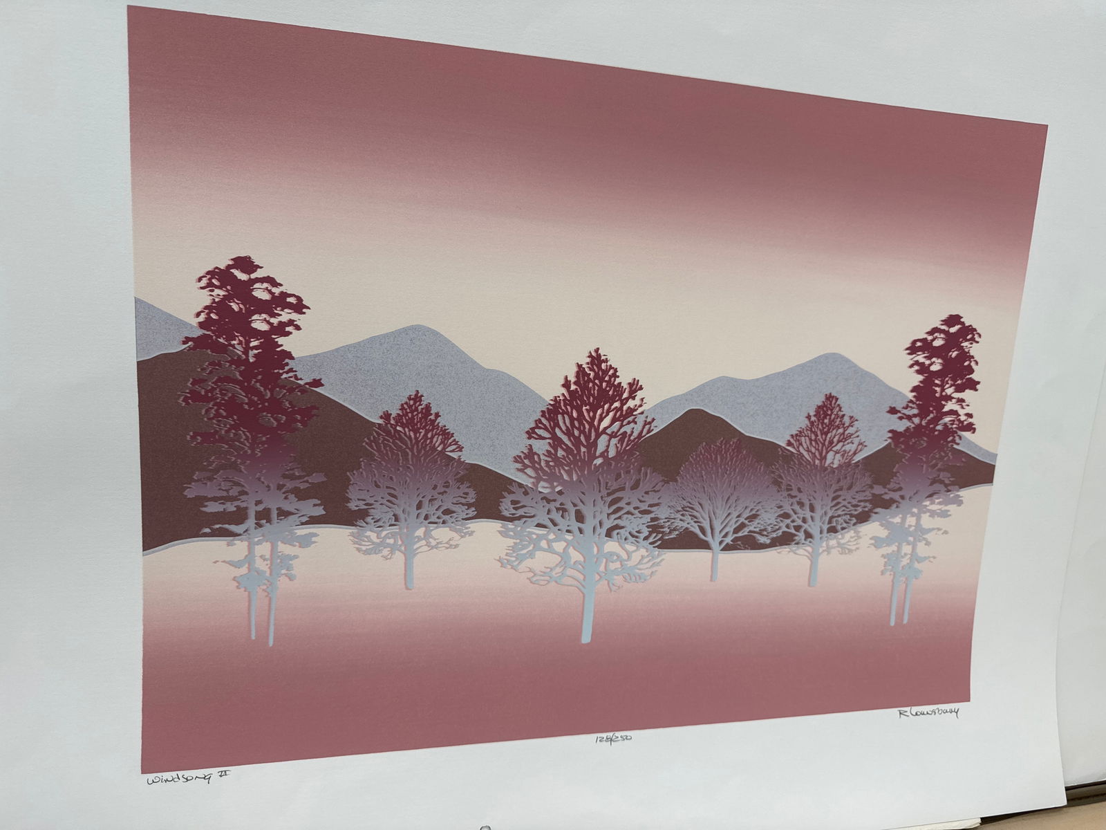 Abstract Landscape Print by R. Lownsbery: Abstract print featuring an upside-down landscape with trees and mountains in shades of brown, gray, and white. Signed 'R. Lownsbery' in the bottom right corner and numbered 128/250 in the cen