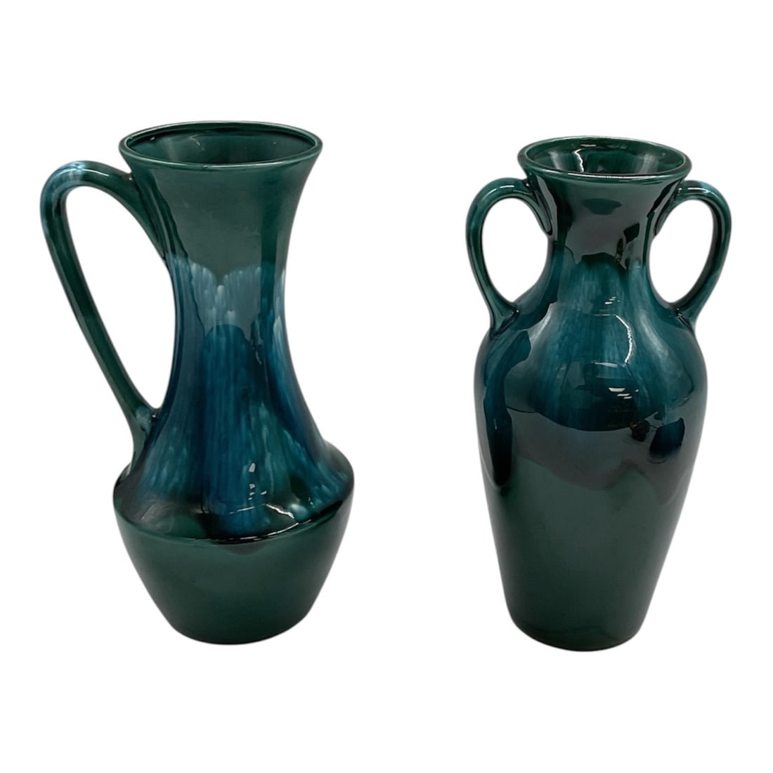 North Carolina's J.B. Cole Pottery 9.5 5 both: Blue Mountain Pottery pieces from Canada, known for their distinctive "drip" or "flow" glaze.Vessel 1 (Left): A vintage ceramic pitcher or jug featuring a high, sweeping