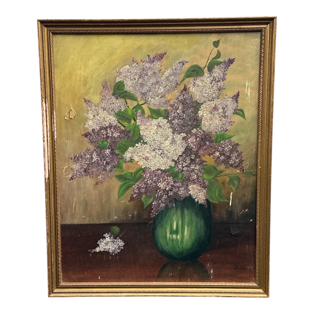 Original Floral Still Life Painting by Helen Garraux, 1937, Framed: This original still life painting depicts a full bouquet of lilac blossoms arranged in a green vase set upon a wooden surface. The composition is rendered with soft, expressive brushwork that