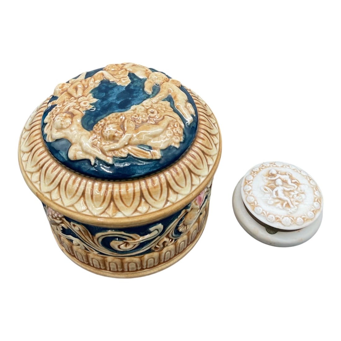 Pair of Relief Decorated Ceramic Lidded Boxes with Cherub Motif (1 of 5)