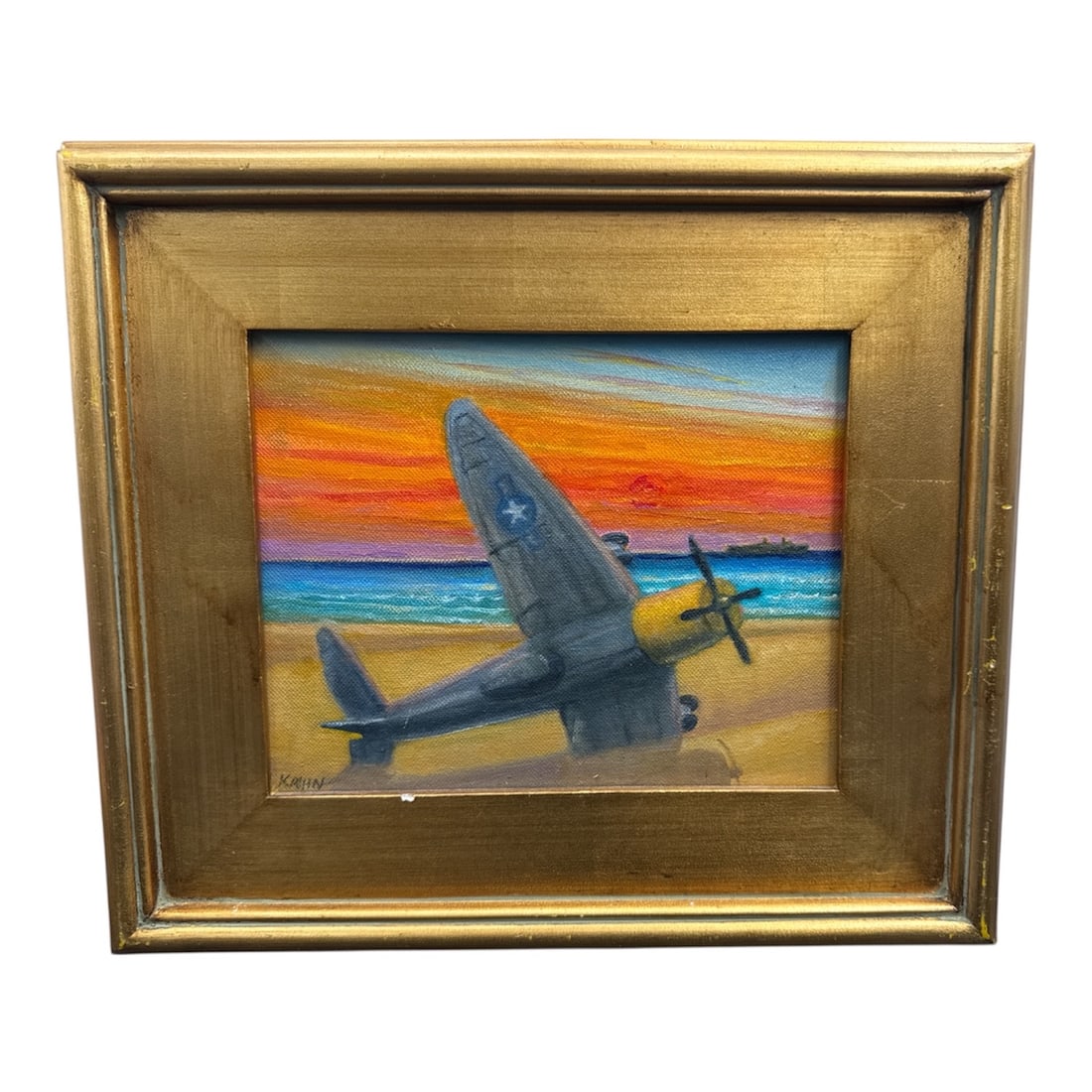Signed Aviation Painting of WWII Fighter Plane at Sunset, Framed: This original painting depicts a World War II era fighter aircraft positioned along a shoreline at sunset, with vivid bands of orange, pink, and blue stretching across the sky above calm water. The dr