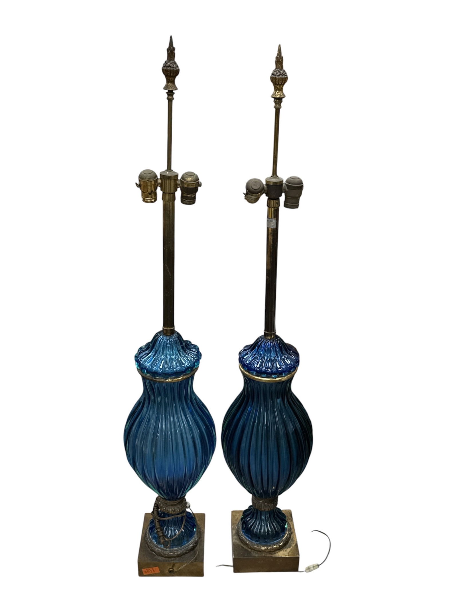 Pair of Marbro Blue Murano Glass Table Lamps: Elegant pair of Marbro table lamps featuring vibrant blue Murano glass bodies with a ribbed, baluster form. Each lamp displays rich cobalt tones with subtle tonal variation, mounted on square bases wi