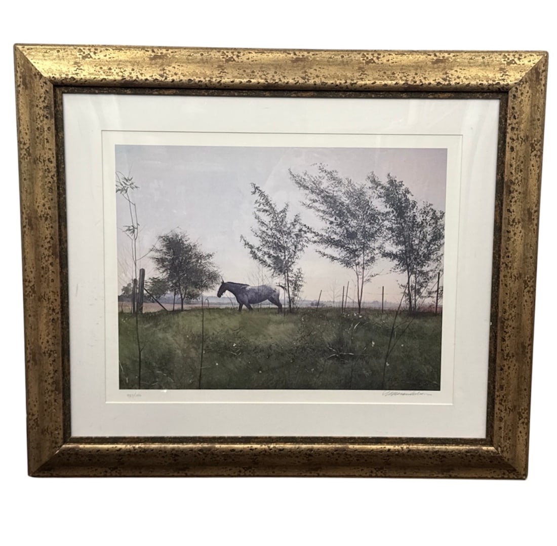 William Nelson Horse and Meadow Limited Edition Offset Lithograph Framed 987/1000: Limited edition offset lithograph titled Horse and Meadow by artist William Nelson. This tranquil pastoral scene depicts a solitary horse standing in an open meadow beneath softly windswept trees, cre