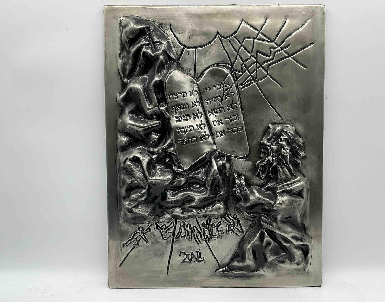 Ten Comandments Platinum Bas Relief by Salvador Dali (Spain, 1904-1989): 10 commandments relief plaque by Salvador Dali, this piece was from the personal collection of Larry King. Numbered 18 of 75 from the platinum edition and published by Bill Levine in New York 198