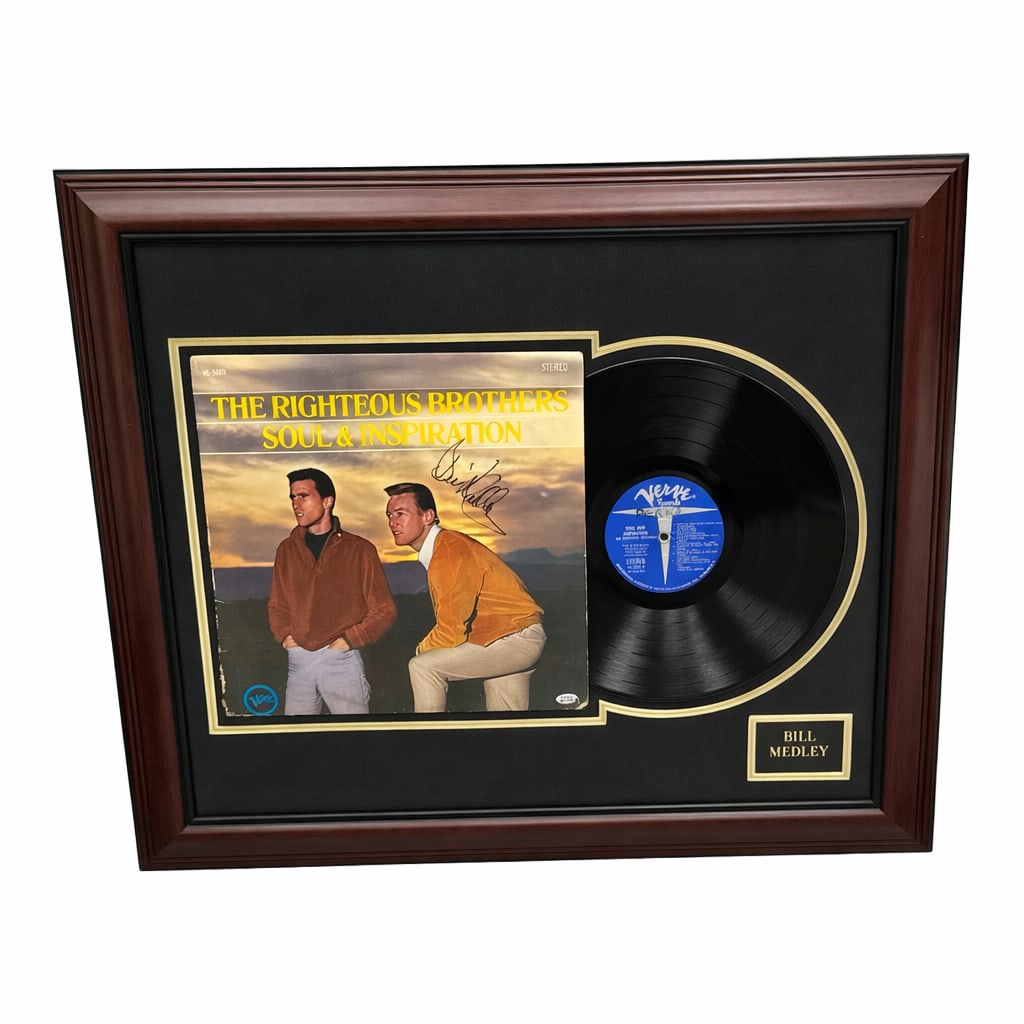 The Righteous Brothers Soul and Inspiration Album Display Signed by Bill Medley: Framed display featuring The Righteous Brothers album Soul and Inspiration alongside a vinyl record and engraved nameplate. The album cover is hand signed by Bill Medley, one half of the legendary Ame