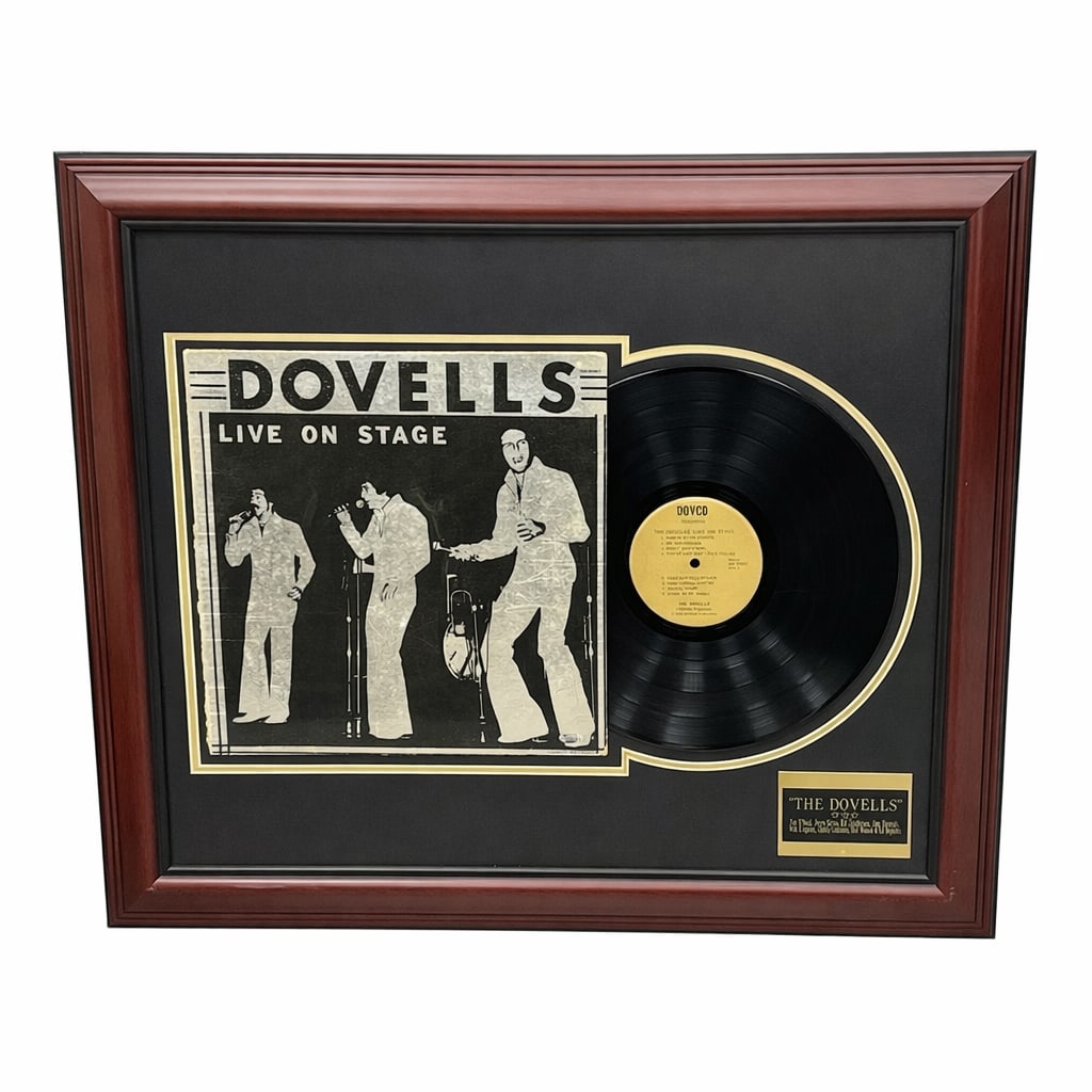 The Dovells Live on Stage Multi Signed Record Album Display: Framed display featuring the record album Dovells Live on Stage accompanied by a vinyl record and presentation plaque. The album cover has been hand signed by members of the American doo-wop and rock
