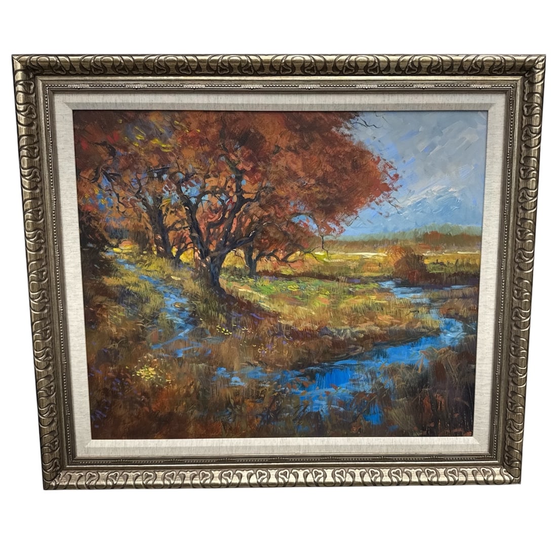 Autumn Landscape by Michael Schofield Original Oil Painting: Original landscape painting titled Autumn by Park West artist Michael Schofield. The composition depicts an autumn countryside scene with richly colored trees, a winding stream reflecting the sky, and