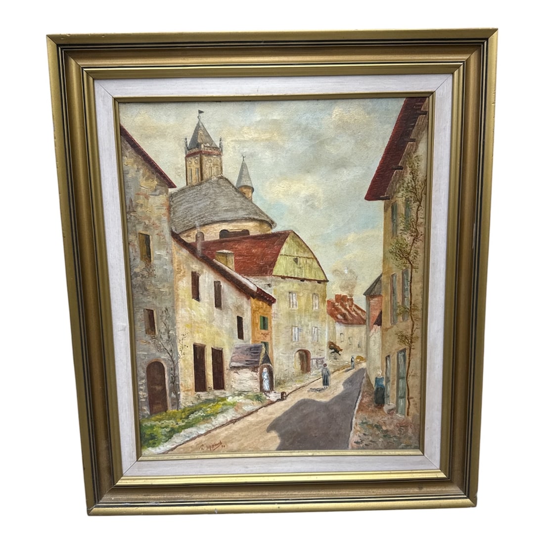 French Village Street Scene by R. Missbach Oil Painting: Original oil on canvas painting depicting a quiet French village street with historic stone buildings, sloped rooftops, and a church tower rising in the background. The composition captures a narrow r