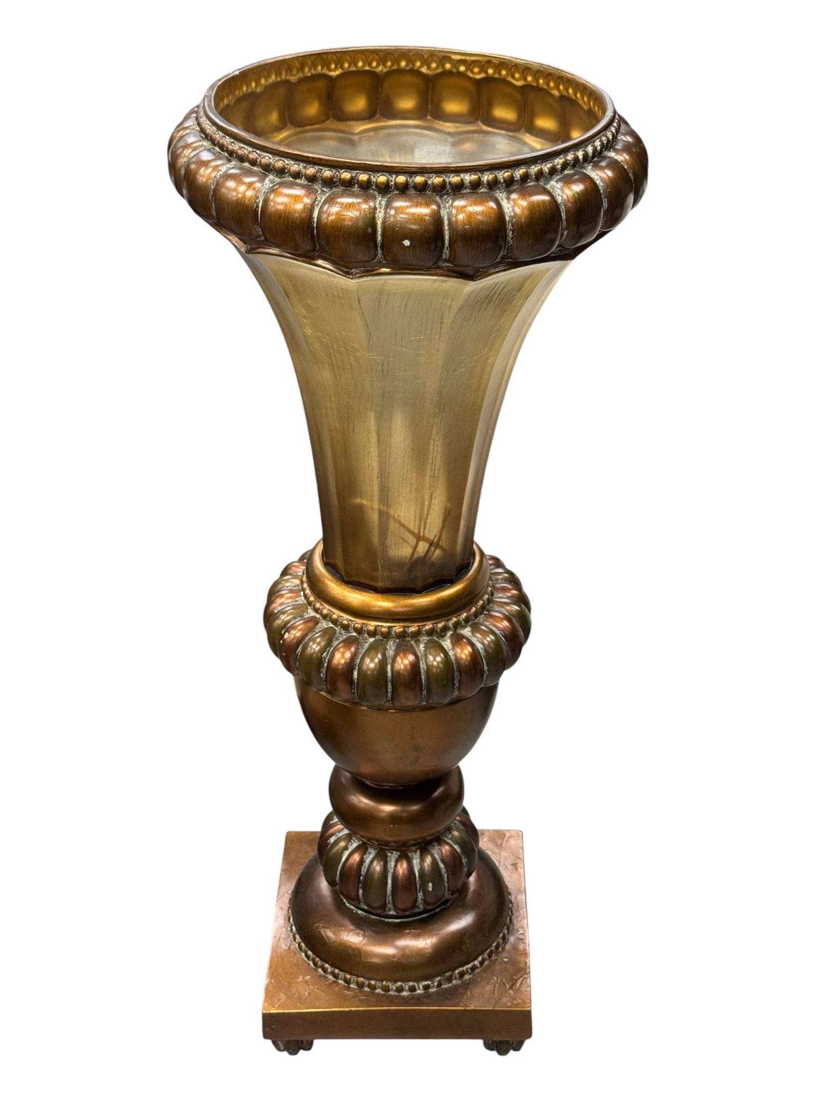 Monumental Italian Style Gilt Decorative Pedestal Urn: A monumental Italian style decorative pedestal urn featuring an elegant flared trumpet form with rich gilt and bronze-toned finishes. The wide scalloped rim displays a repeating rounded motif that con