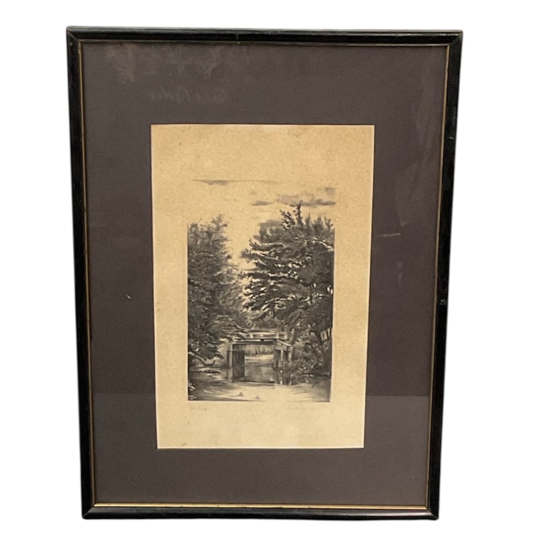Signed Landscape Etching of Rustic Bridge Scene. Artist Unkown: Framed black and white etching depicting a tranquil rustic landscape with a wooden bridge spanning a calm stream, surrounded by dense trees and foliage. The composition highlights delicate linework