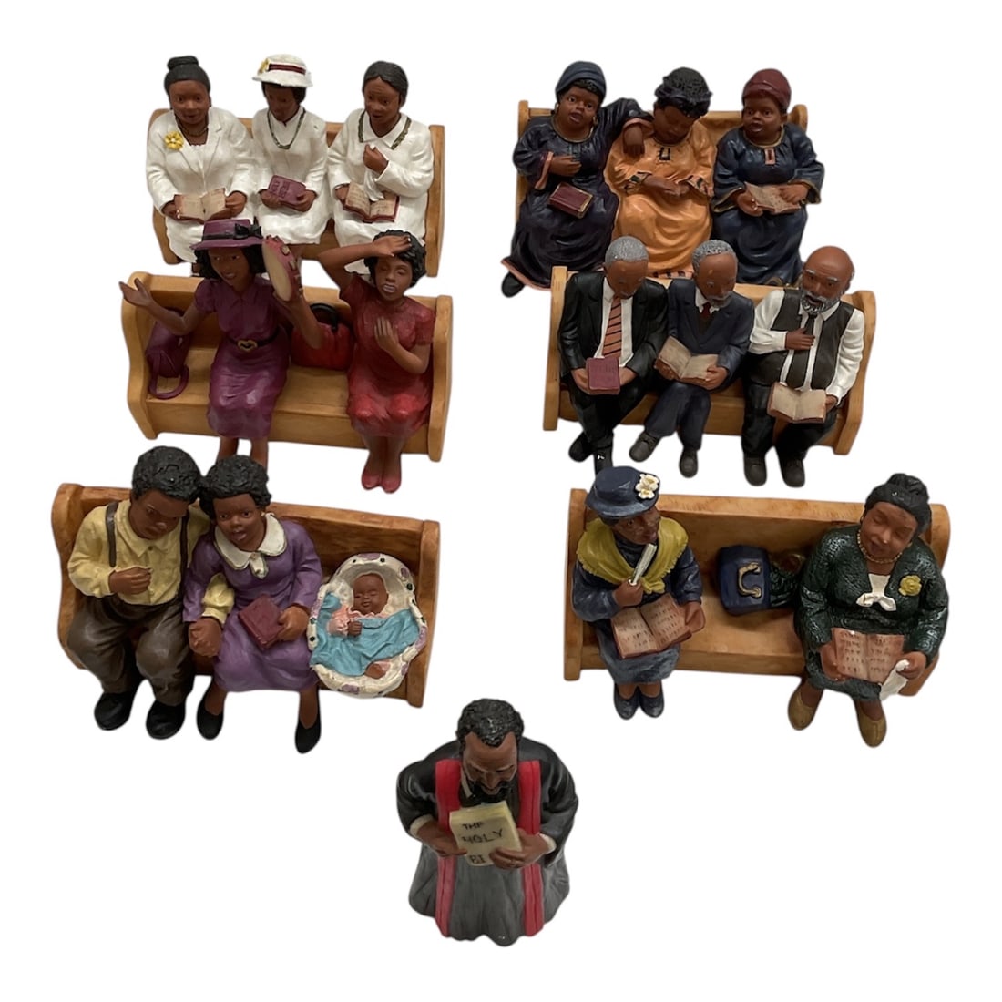 Collection of Figural Bench and Seated Figures: Charming collection of detailed figural sculptures depicting seated groups on benches and individual figures in thoughtful poses. The grouping includes multiple scenes of men, women, and children enga