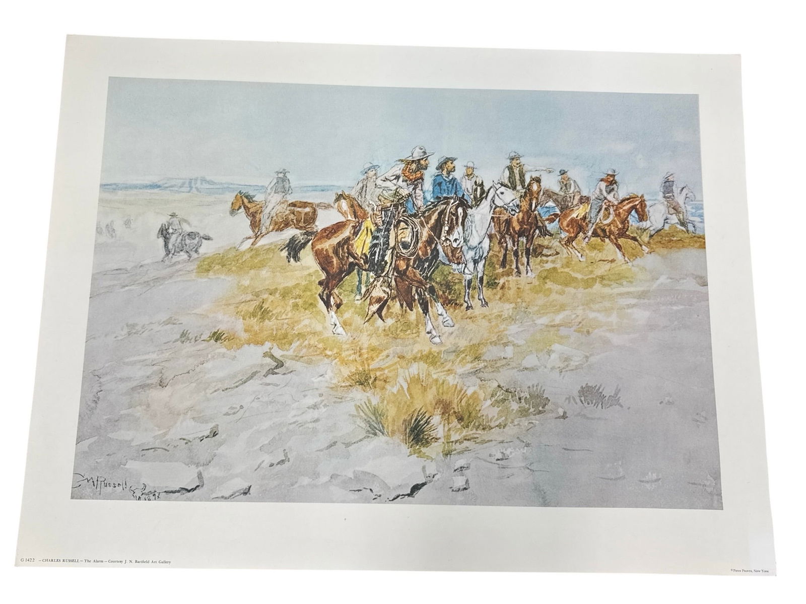 Charles M Russell The Alarm Cowboy Western Print: Offered is a Western print titled The Alarm by renowned American artist Charles M Russell. The composition captures a dramatic frontier scene with mounted cowboys riding swiftly across open plains, ho