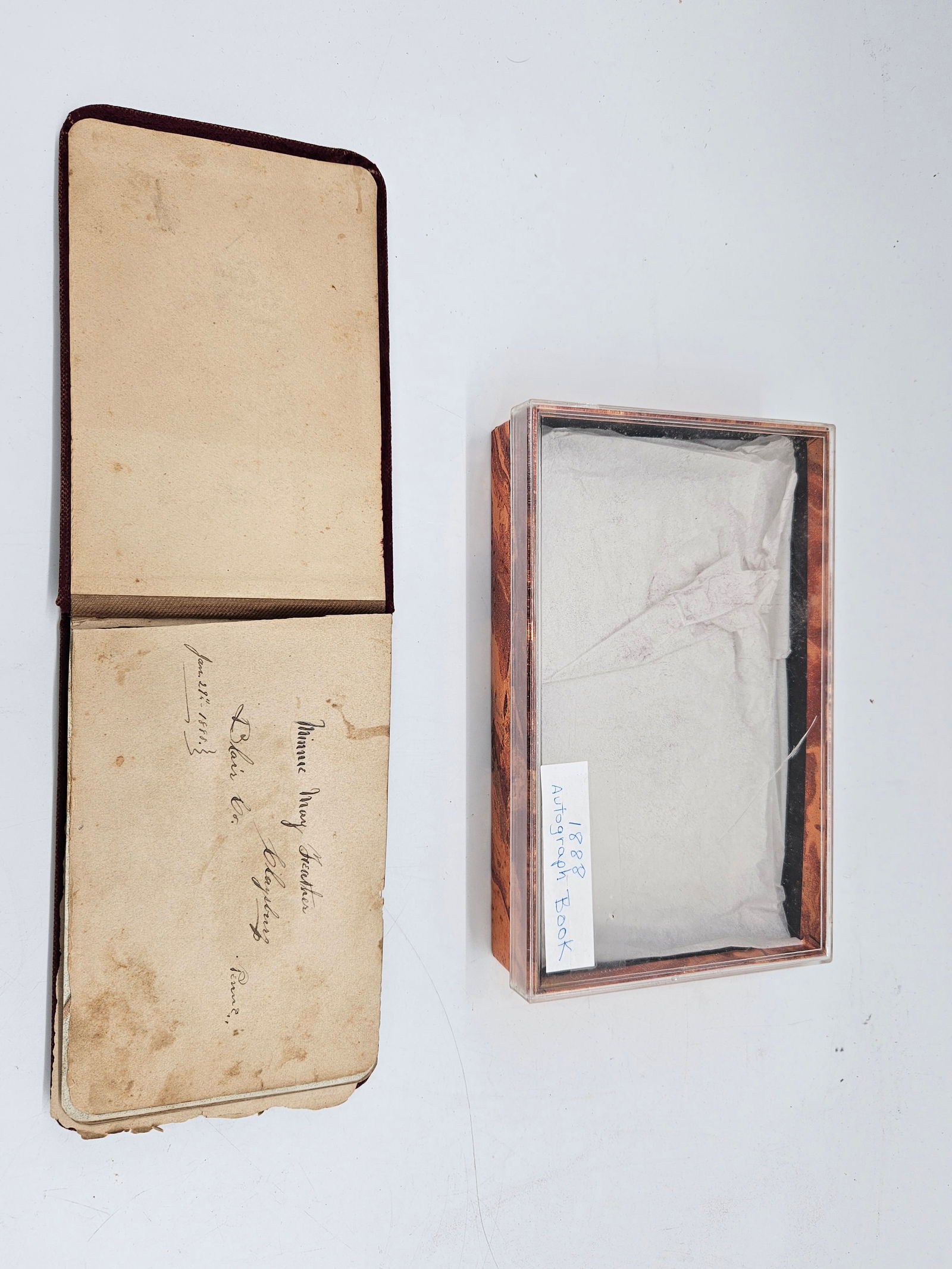 Antique Autograph Book with Wooden Box: Antique autograph book with a red velvet cover, housed in a wooden box. The book contains various signatures and inscriptions, some dated around 1901. Box measures 7.5 x 4.5 x 2 inches.
