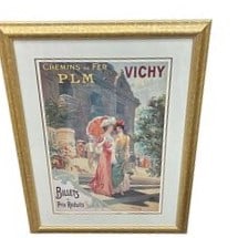 Framed Reproduction of a Vintage "Chemins de Fer PLM: Vichy" Travel Poster, After Ploz, c. 1900: DescriptionThis lot features a framed reproduction print of a classic French travel advertisement poster for the town of Vichy. The original artwork, created around 1900 by the artist known