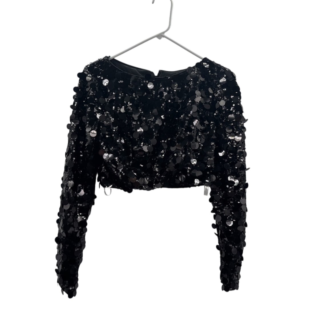 Ava Presley Black Beaded Sequin Long Sleeve Crop Top Size 8: A glamorous black beaded crop top by Ava Presley, richly embellished with sequins and hand beading that create a dramatic shimmering effect. The top features a cropped silhouette with long fitted slee