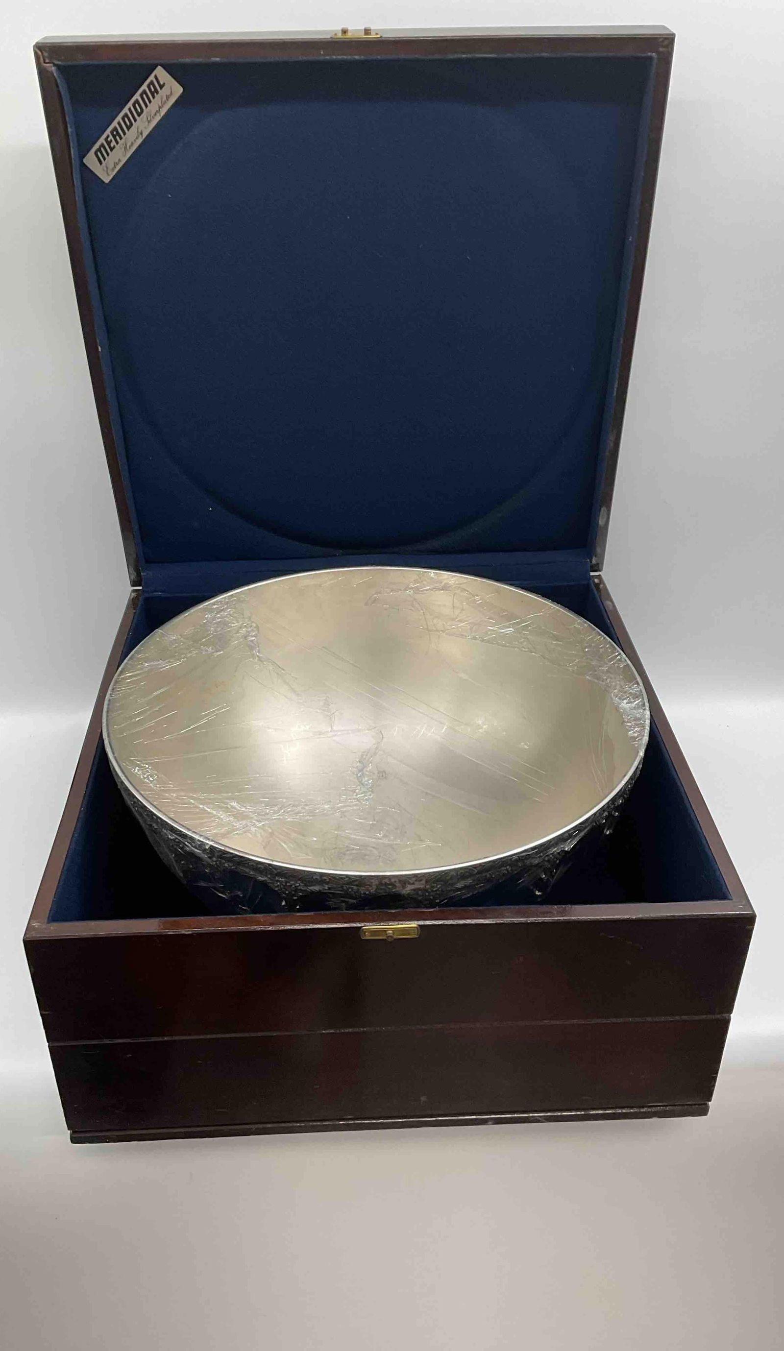 Silver Plate Punch Bowl with Wooden Storage Chest: Large silver-plated punch bowl presented in a fitted wooden storage chest. Elegant and functional piece suitable for entertaining, with polished reflective finish and protective case.Medium Silver