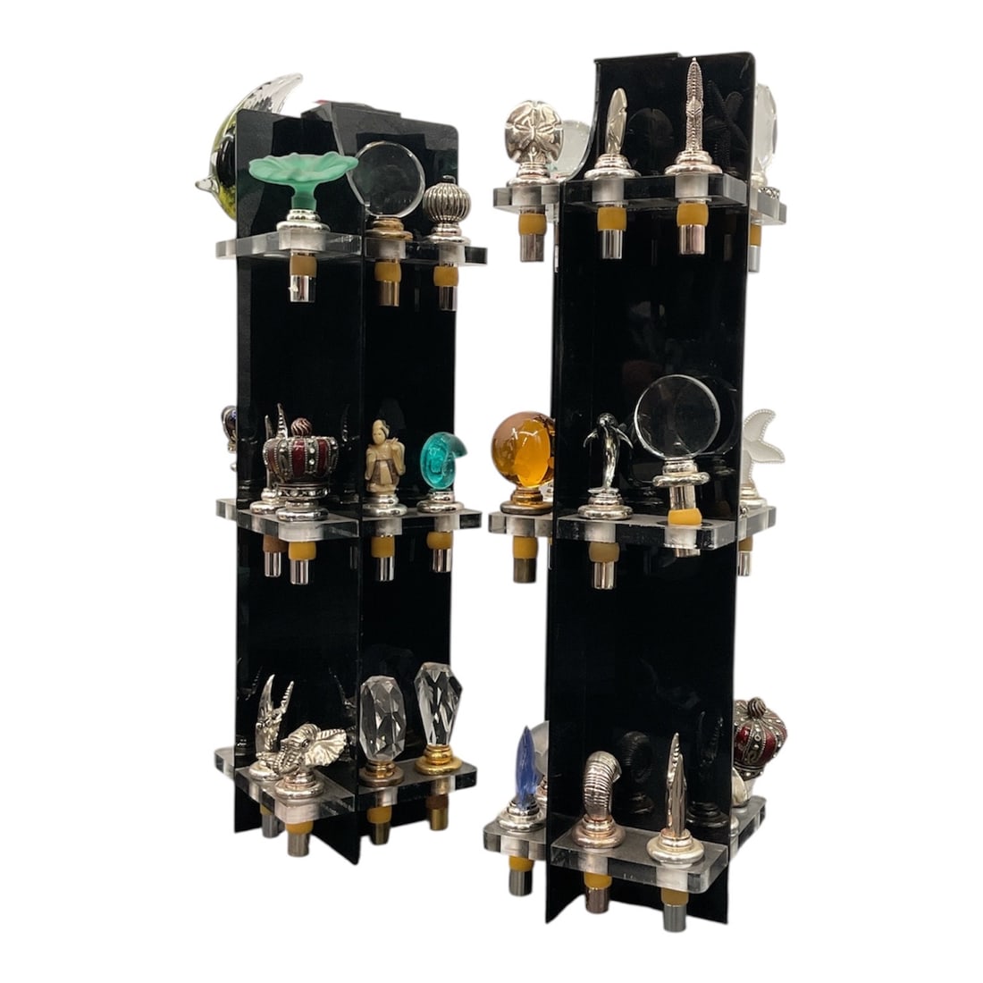 Collection of Decorative Bottle Stoppers with Custom Displays: Collection of Decorative Bottle Stoppers with Custom DisplaysItems: A varied collection of approximately unique bottle stoppers featuring a range of decorative toppers.Topper