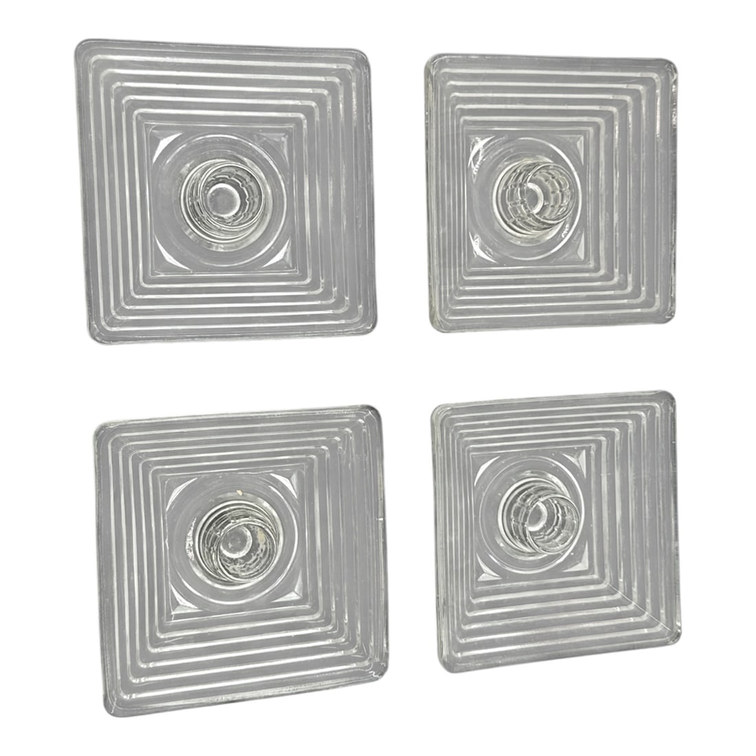 Set of Four Art Deco Style Clear Pressed Glass Candlestick Holders 4x4in Each: Striking set of four clear pressed glass candlestick holders featuring a bold concentric stepped geometric design with circular center detail. The architectural square form reflects classic Art Deco s
