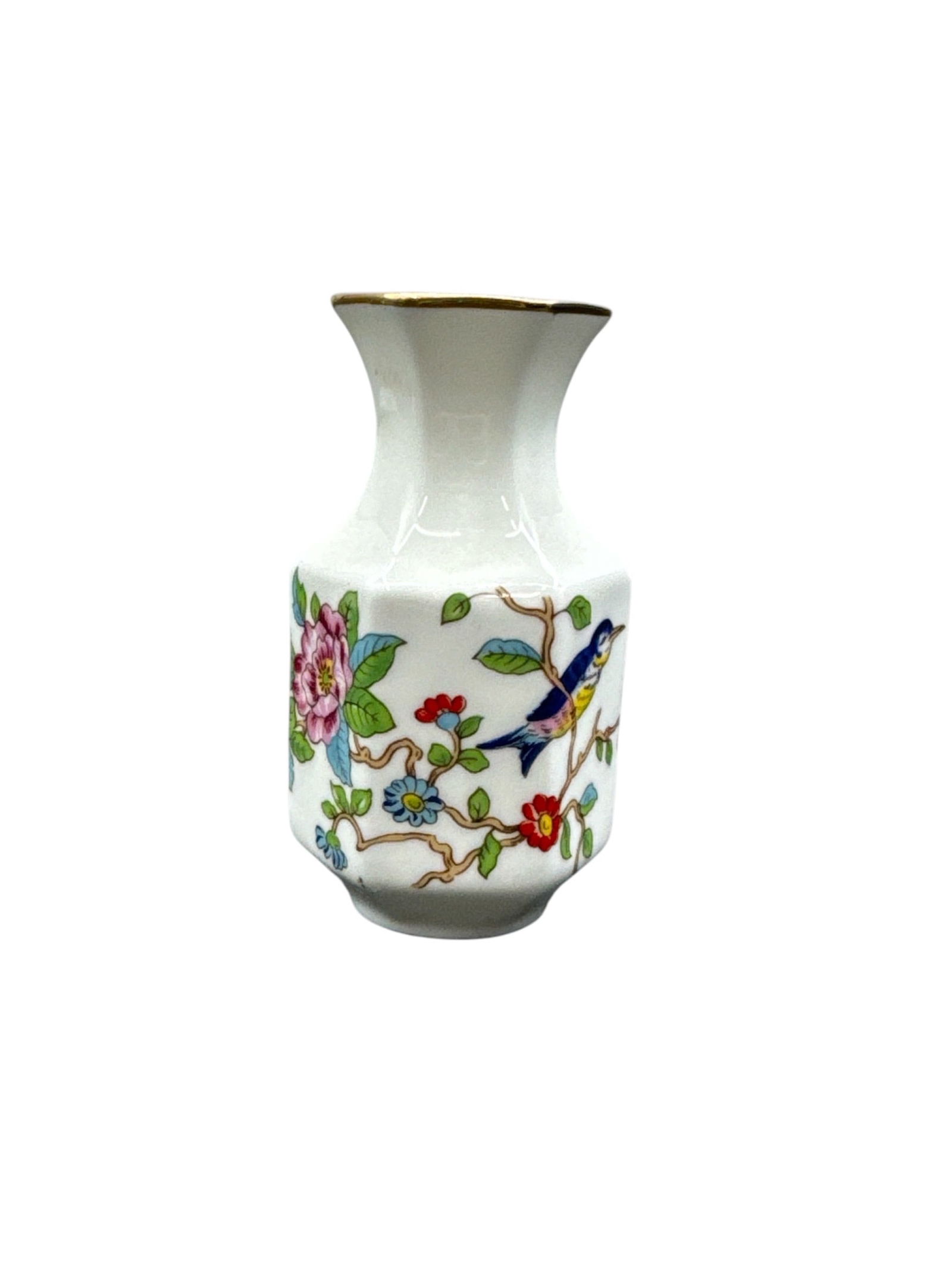 Aynsley Fine English Bone China Floral Miniature Vase: This petite vase is crafted by Aynsley in fine English bone china and features a classic floral and bird motif rendered in vibrant hand-applied colors. The faceted body is decorated with blossoming fl