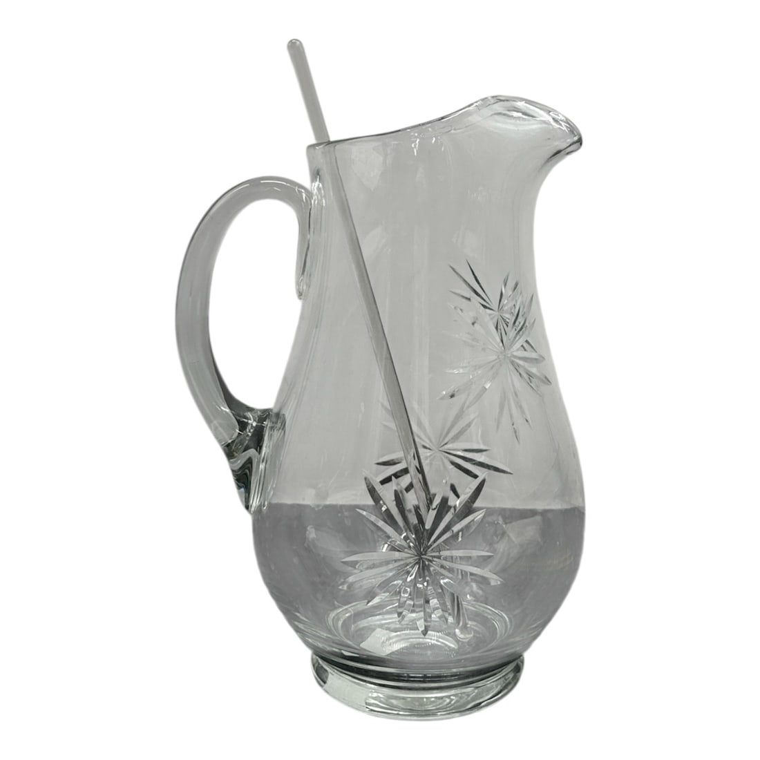Vintage Cut Glass Pitcher with Starburst Etching and Stirrer: Beautiful vintage glass pitcher featuring an elegant curved form with etched starburst and floral motifs. The piece includes its original glass stirrer, making it both functional and decorative. A won