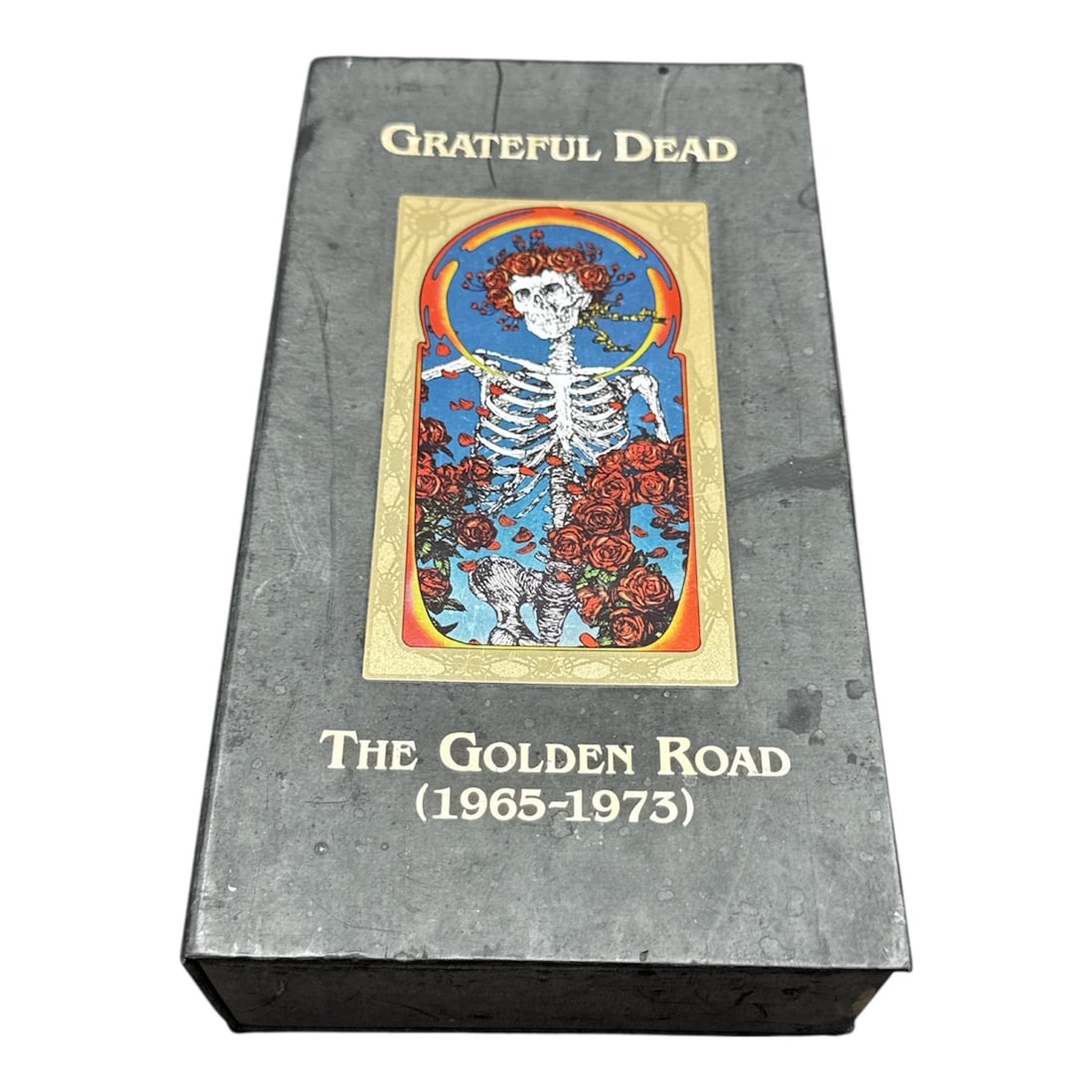 Grateful Dead “The Golden Road (1965–1973)?? Box Set: Iconic Grateful Dead box set titled The Golden Road (1965–1973), presented in its original illustrated slipcase featuring classic skeleton artwork. This comprehensive collection spans the