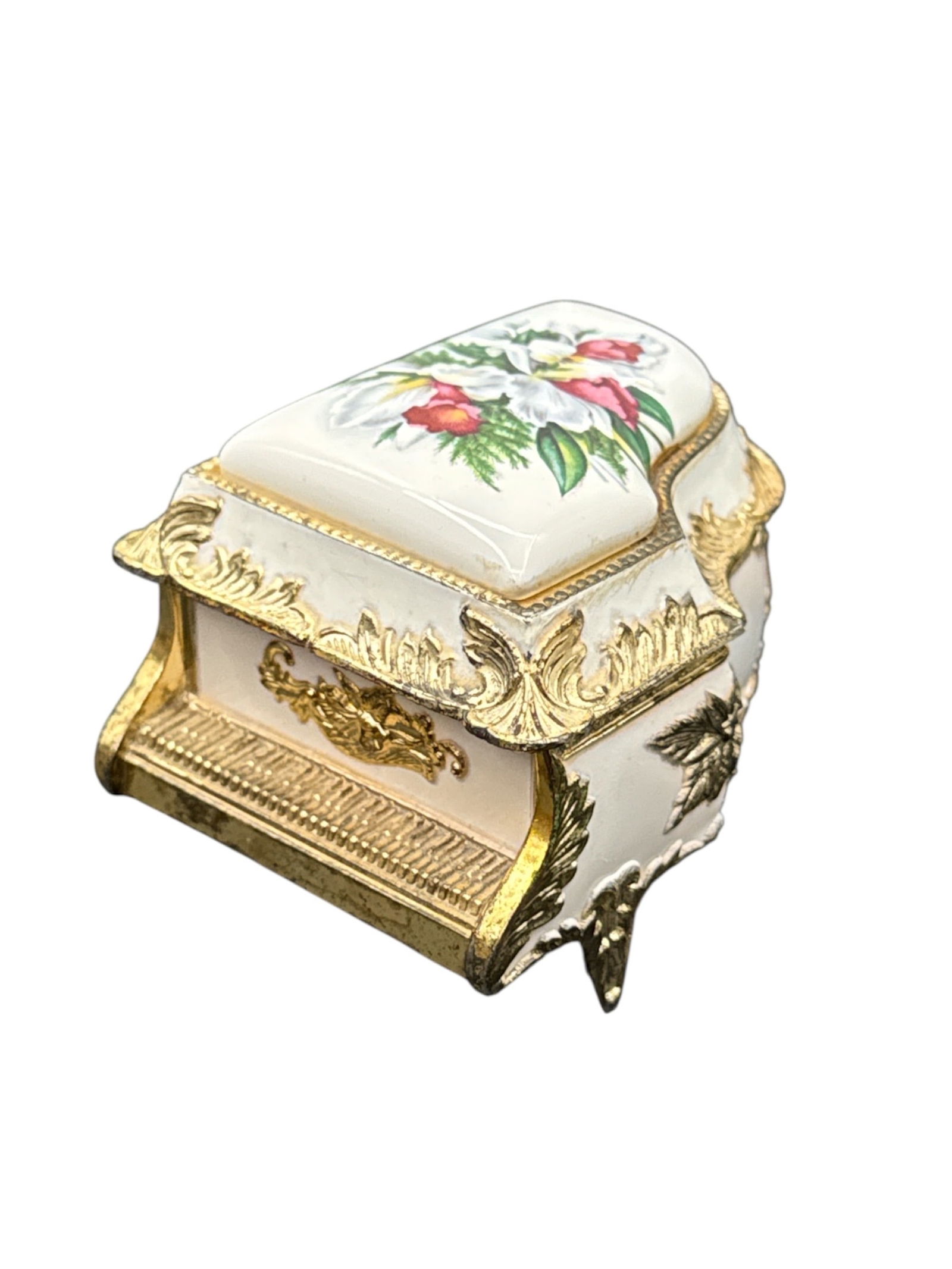 Collectible Mele Grand Piano Musical Trinket Box - Made in Japan: Collectible Grand Piano Musical Trinket Box - Made in JapanItem OverviewThis charming vintage collectible features a grand piano silhouette crafted from a combination of porcelain
