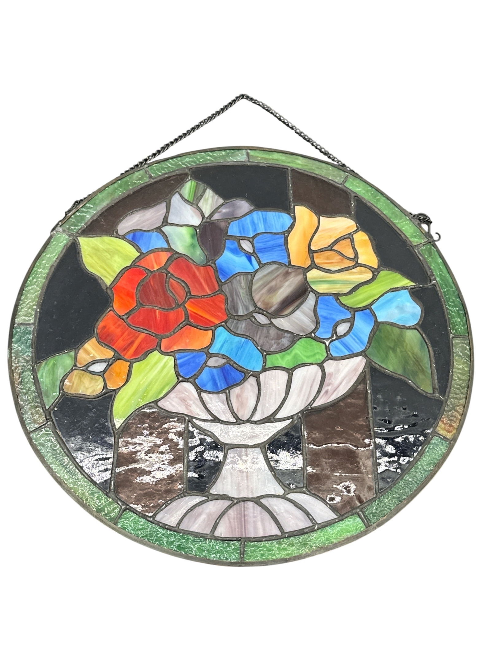 Vintage Stained Glass Floral Suncatcher Panel: This beautiful circular stained glass panel features a vibrant, multi-colored floral bouquet presented in an elegant classi
