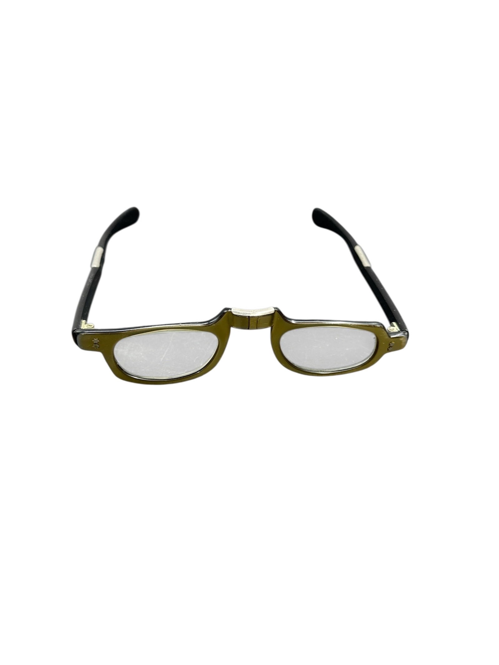 Vintage Folding Reading Glasses: This lot features a pair of vintage folding reading glasses with a compact hinged frame design. The glasses are constructed with a translucent olive-toned front and contrasting black temple arms,