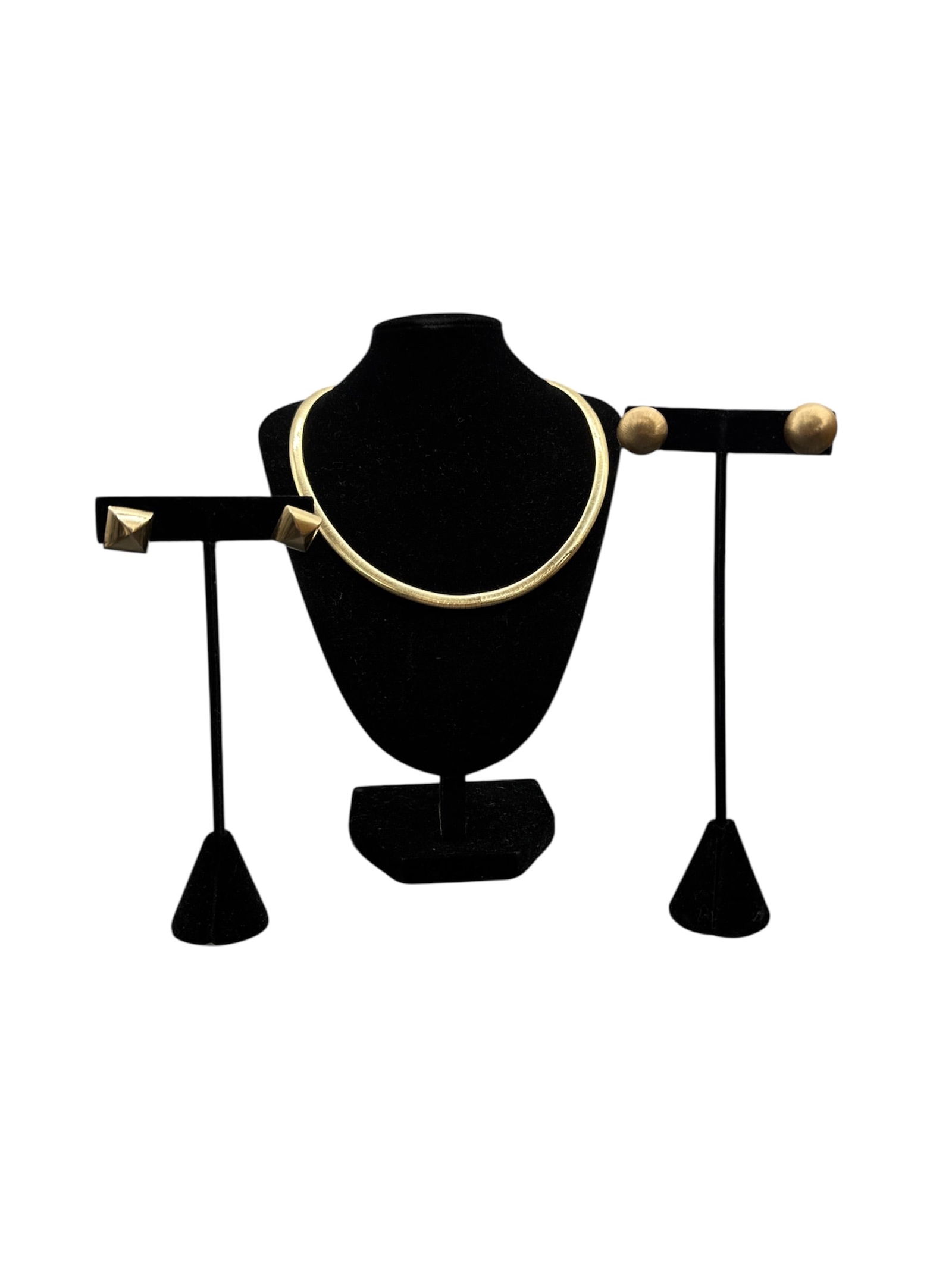 14K Yellow Gold Choker Necklace with Two Pairs of Matching Stud Earrings: This fine jewelry lot includes a 14K yellow gold choker-style necklace accompanied by two pairs of matching 14K gold stud earrings. The necklace is designed in a rigid circular form with a hinged