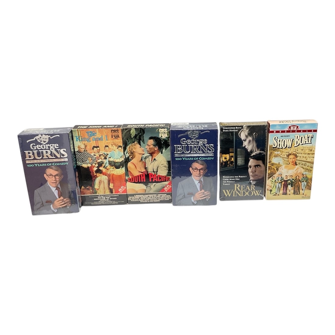 Vintage VHS Collector's Lot - George Burns, Rear Window, South Pacific, Show Boat: Description:Add a touch of nostalgia to your collection with this lot of vintage VHS tapes. This set features a diverse mix of entertainment, including:Comedy: A special "Best Of"