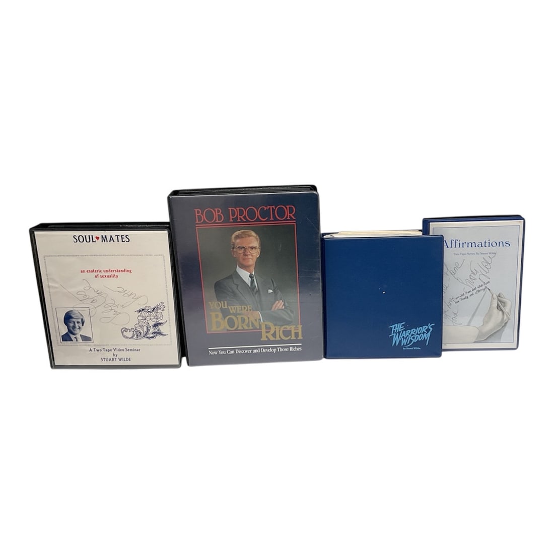 Collection of Development & Motivational Materials by Bob Proctor: .The most prominent item is a vintage copy of "You Were Born Rich", one of Proctor's most famous works. These materials are often found as part of multi-media success seminars or