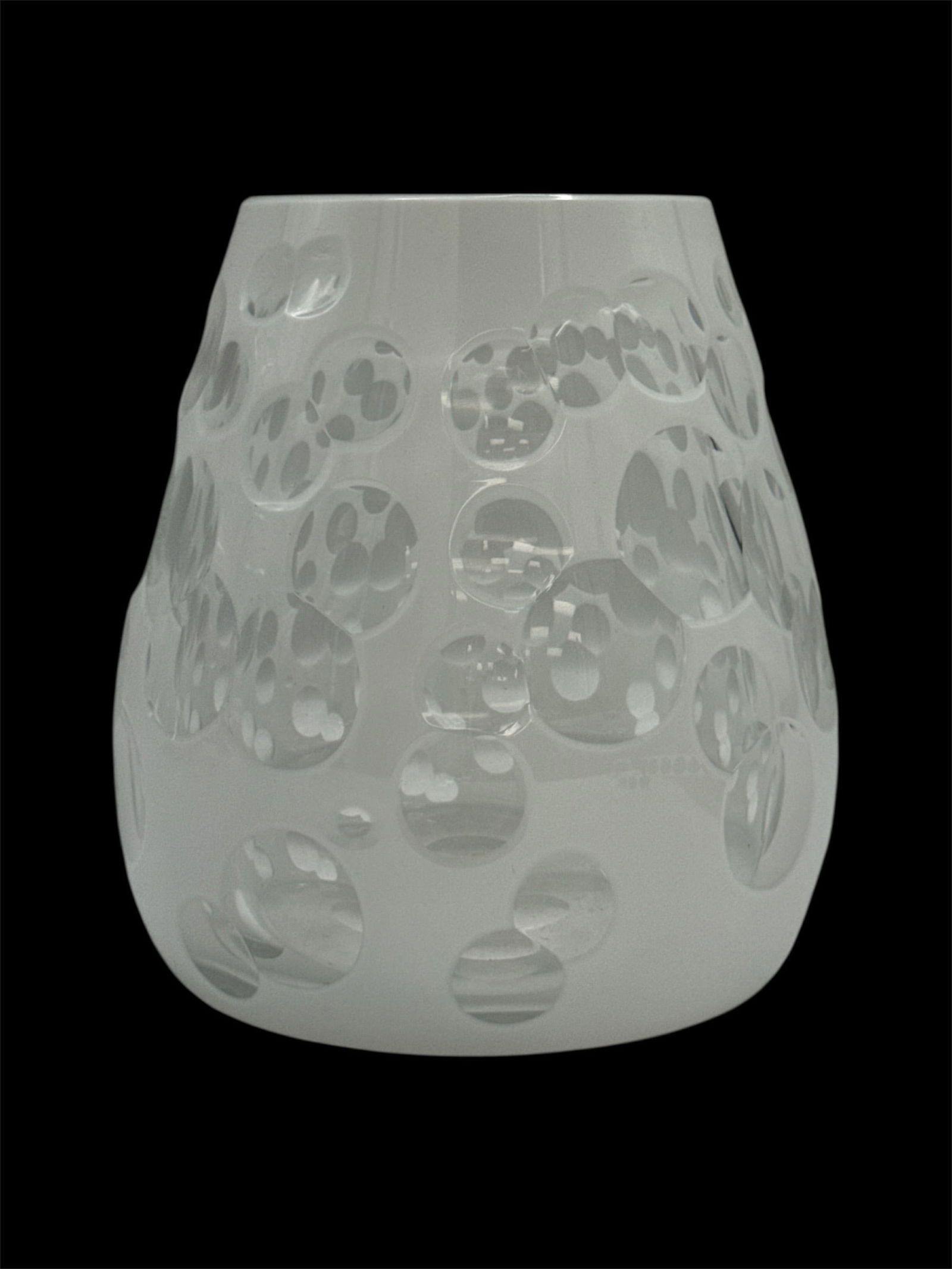 Modern Frosted Glass Vase with Polished Dot Motif: A modern frosted glass vase featuring an organic tapered form with polished circular dot motifs throughout the body. The contrast between the matte frosted surface and the clear polished ovals