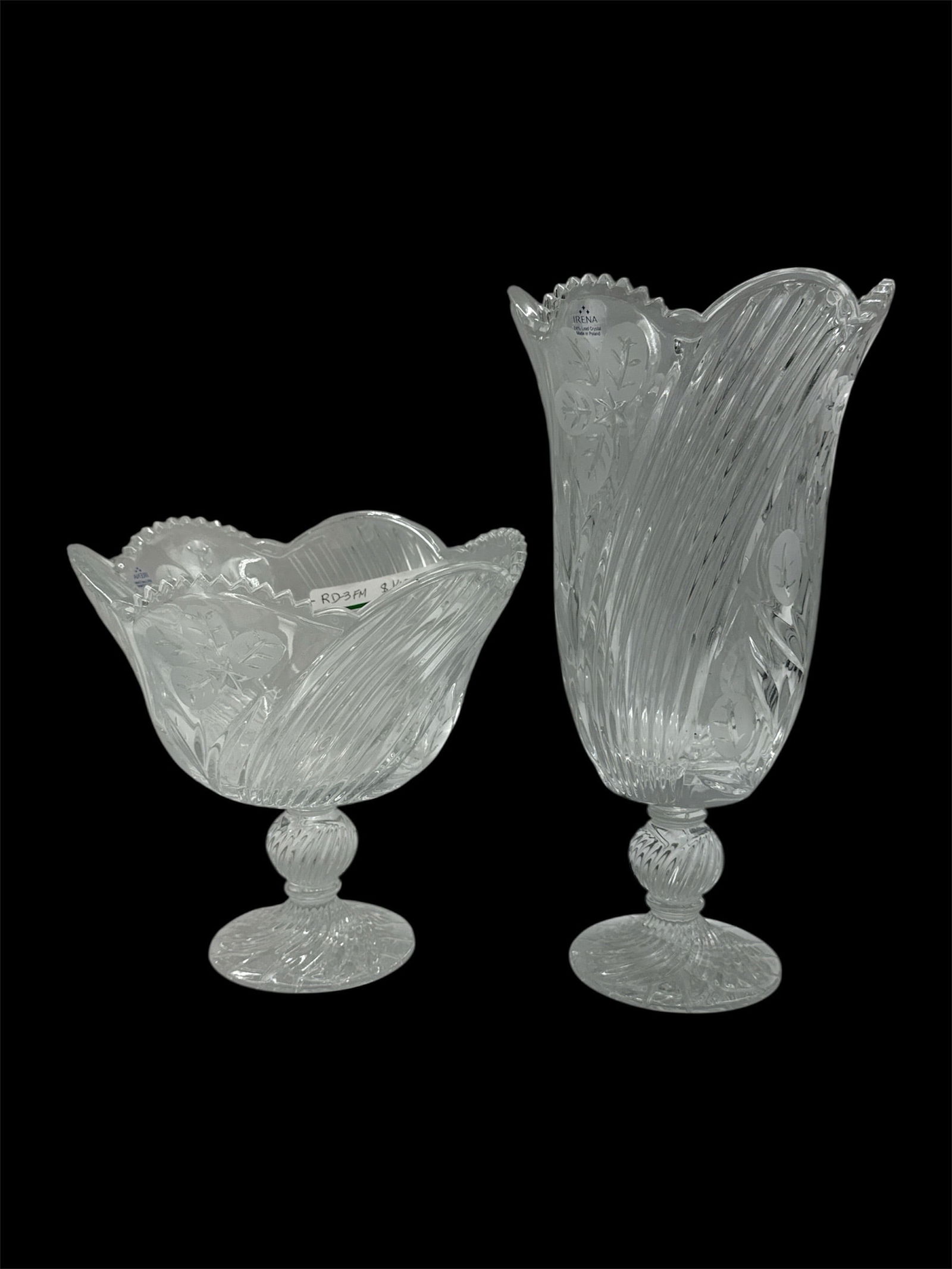 Pair of Etched Glass Pedestal Vases with Scalloped Rim: Elegant pair of clear etched glass vases featuring flowing vertical ribbed detailing and flared scalloped rims. Each vase is raised on a decorative pedestal base with faceted accents, enhancing their