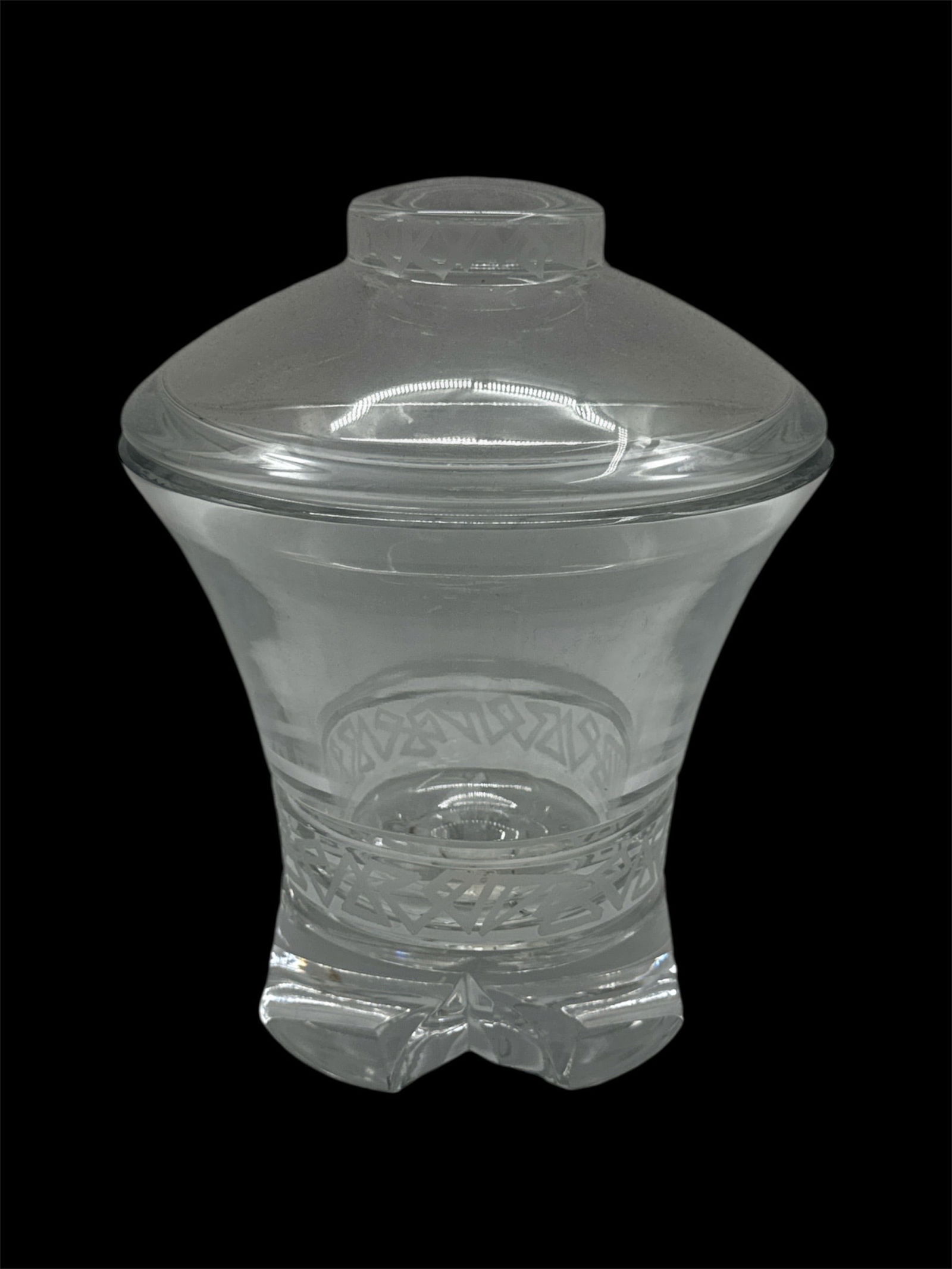 Clear Glass Lidded Urn Form Vase with Panel Base: Elegant clear glass lidded vase in a classic urn form featuring a flared rim and stepped circular foot. The body displays subtle paneling and decorative detailing along the midsection, adding depth