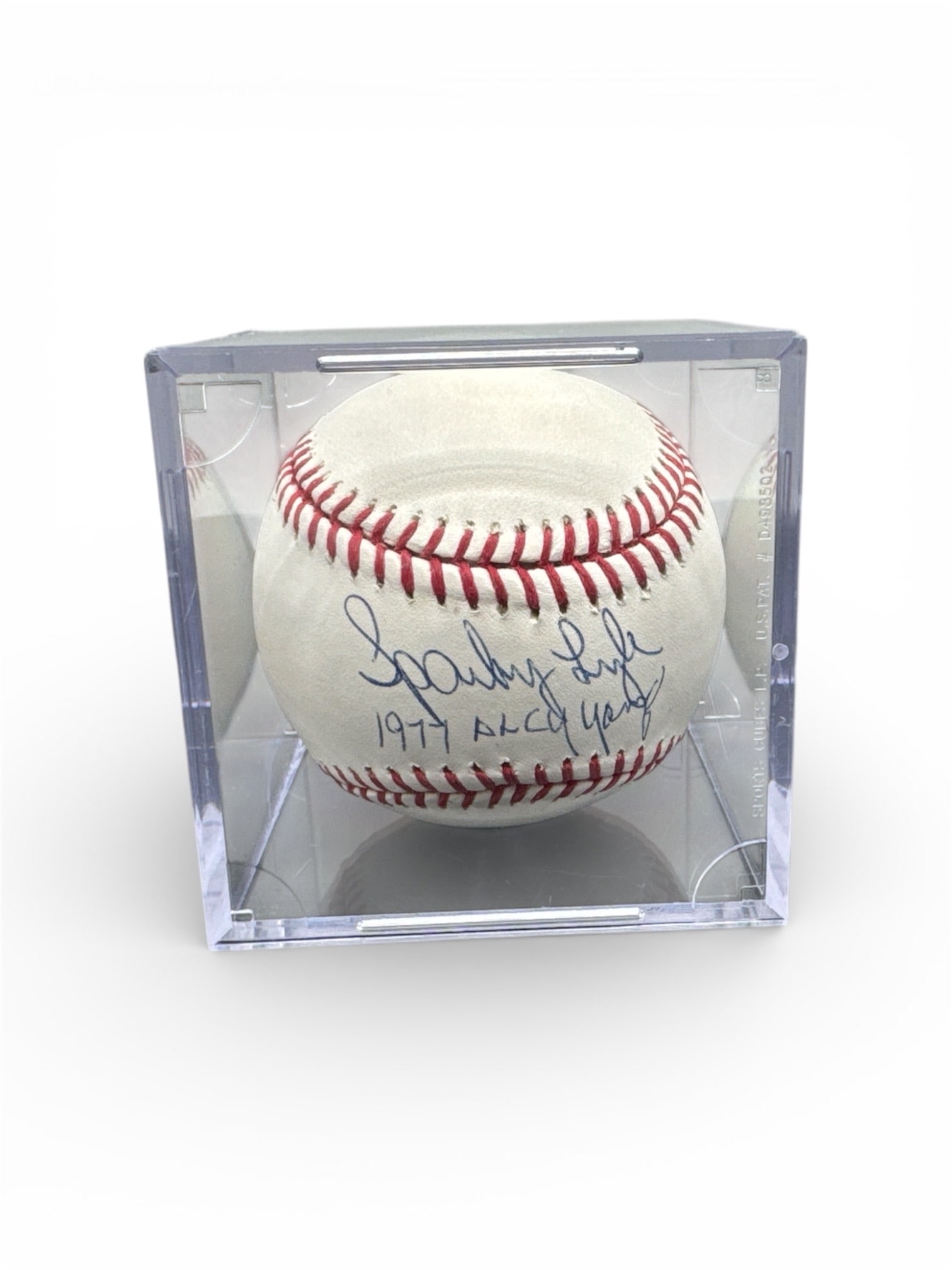 Sparky Lyle Signed Baseball with Inscription and Display Case: This baseball has been hand signed by legendary manager Sparky Lyle, with an added inscription referencing the 1977 World Series. The signature is written in blue ink across the sweet spot area, with