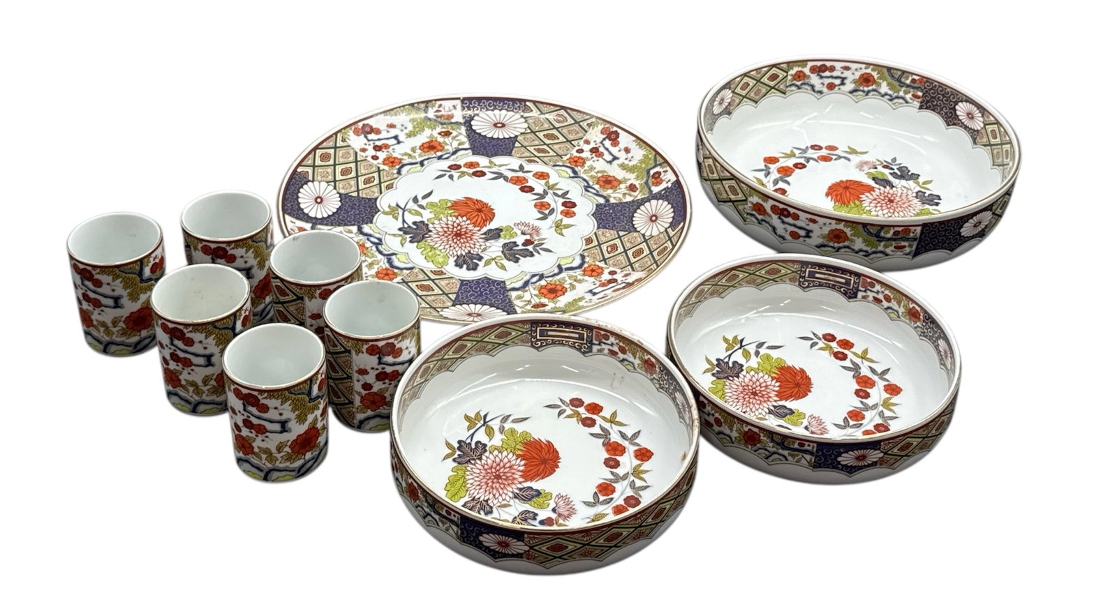 Mizuko Japan Decorative Serving Set with Floral and Geometric Motifs: Colorful porcelain serving set by Mizuko Japan, featuring vibrant hand-painted floral and geometric decoration in traditional Japanese export style. The group includes