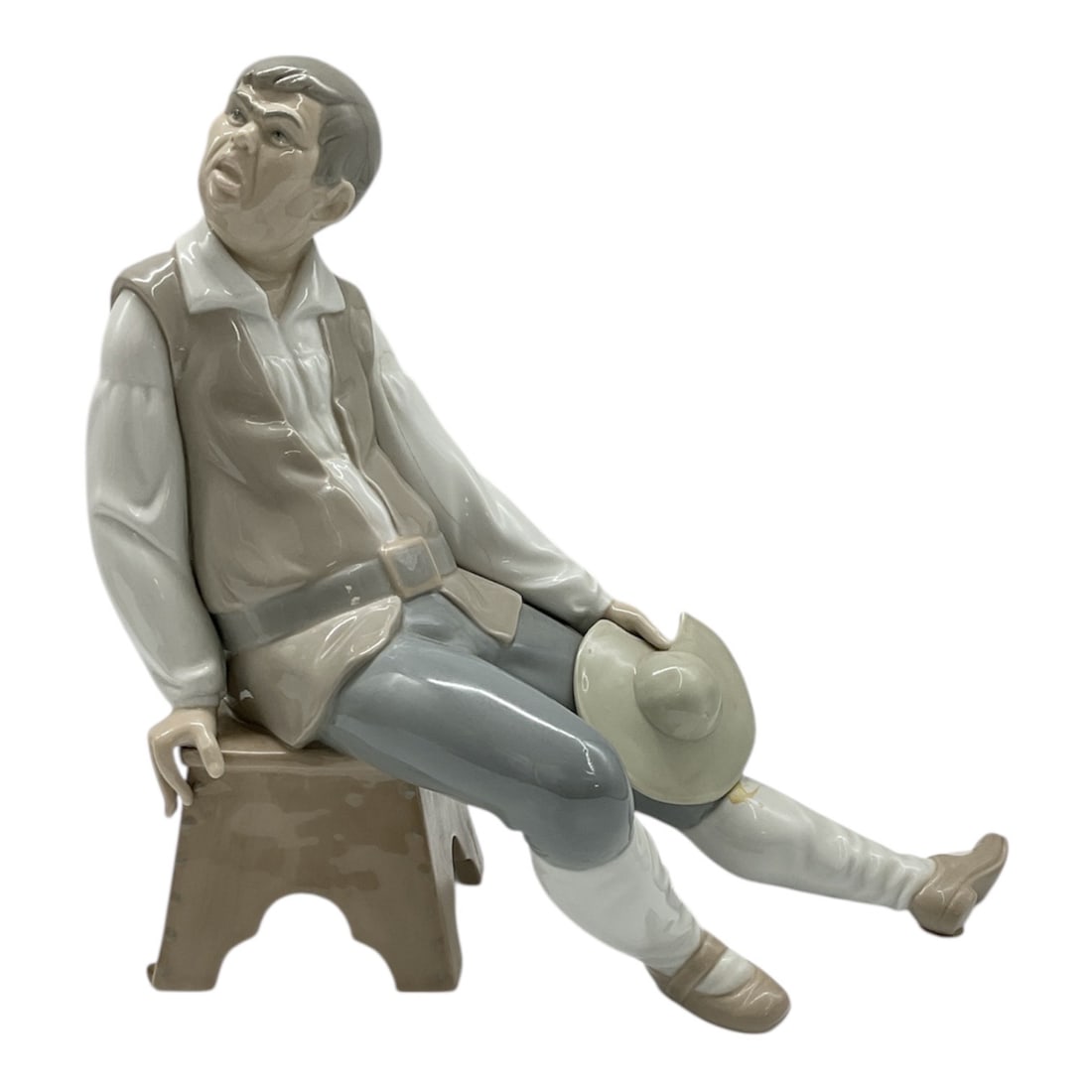 RARE RETIRED Lladro "Sancho Panza" #1031 Glazed Porcelain Figurine (1969-1989) Spain: Description This exquisite, retired Lladro porcelain figurine, titled "Sancho Panza," is a highly collectible piece for enthusiasts