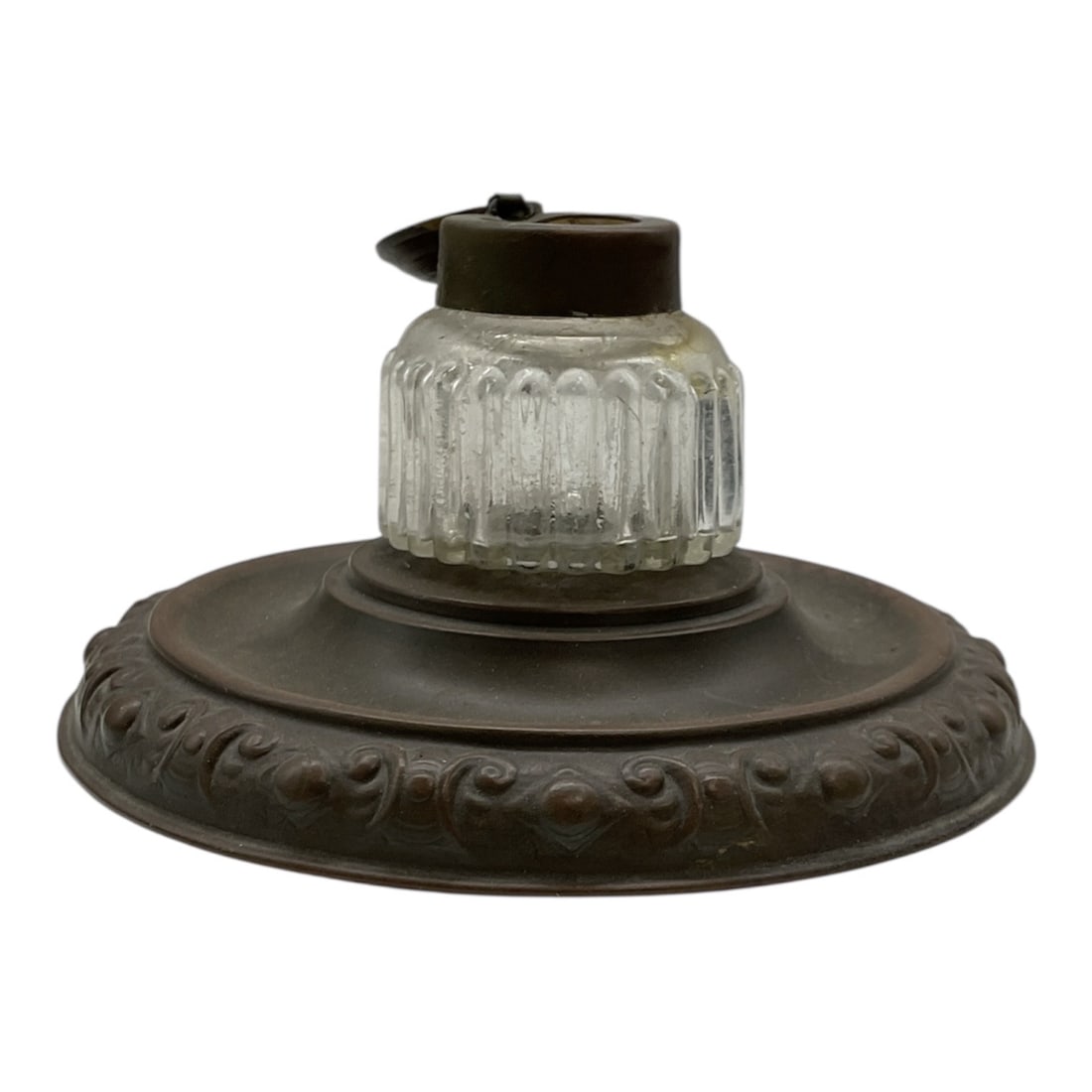 Antique Glass and Patinated Metal Inkwell: antique glass and patinated metal inkwell. To prepare it for auction, you should highlight its construction and aesthetic