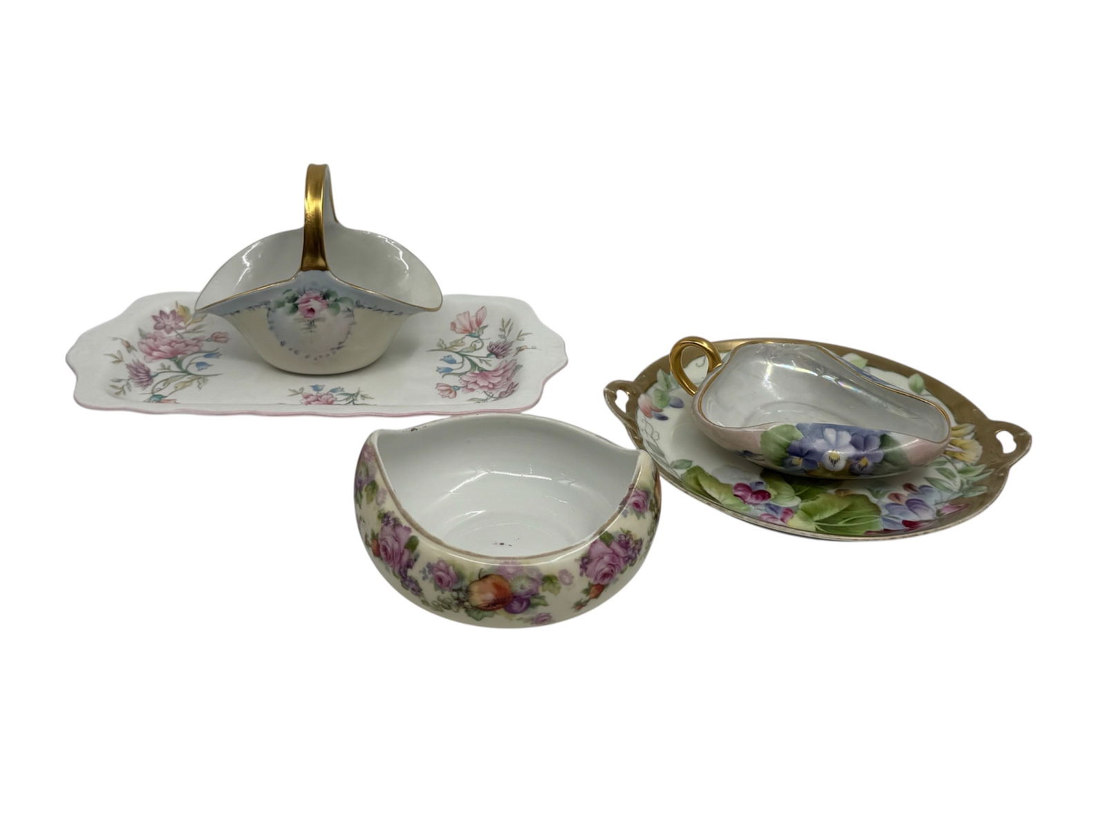 Group of European Porcelain Serving Pieces Including Royal Heritage and Bavarian Examples: A grouping of assorted porcelain serving pieces from European makers, including Royal Heritage of England and several Bavarian manufacturers. The lot includes a rectangular platter decorated with flor