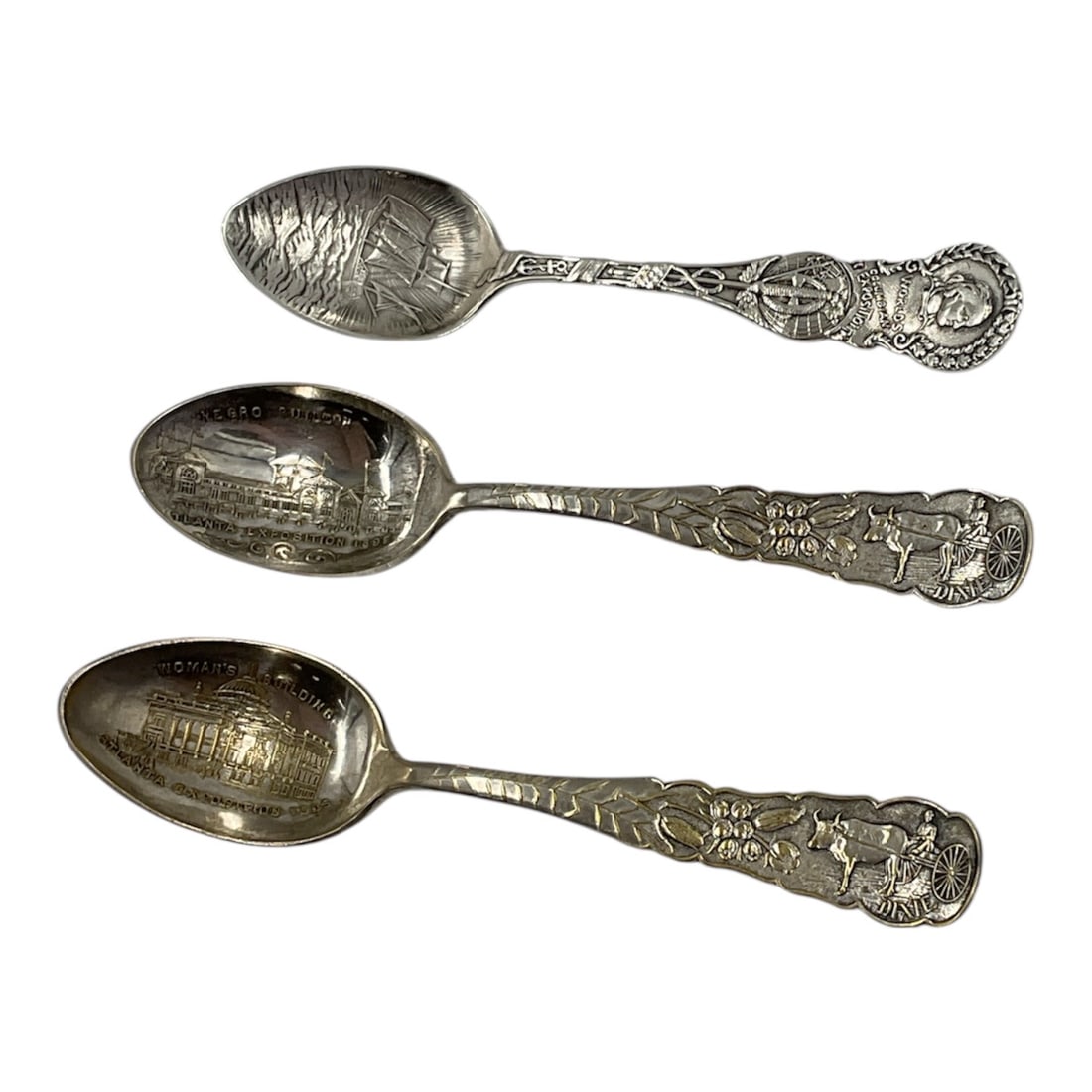 Sterling Souvenir Spoon Collection Atlanta Women’s Building and Negro Building World’s Columbian: Collection of three sterling silver souvenir spoons, including two examples depicting the Women’s Building in Atlanta, Georgia, and one commemorating the Negro Building from the World’s Co